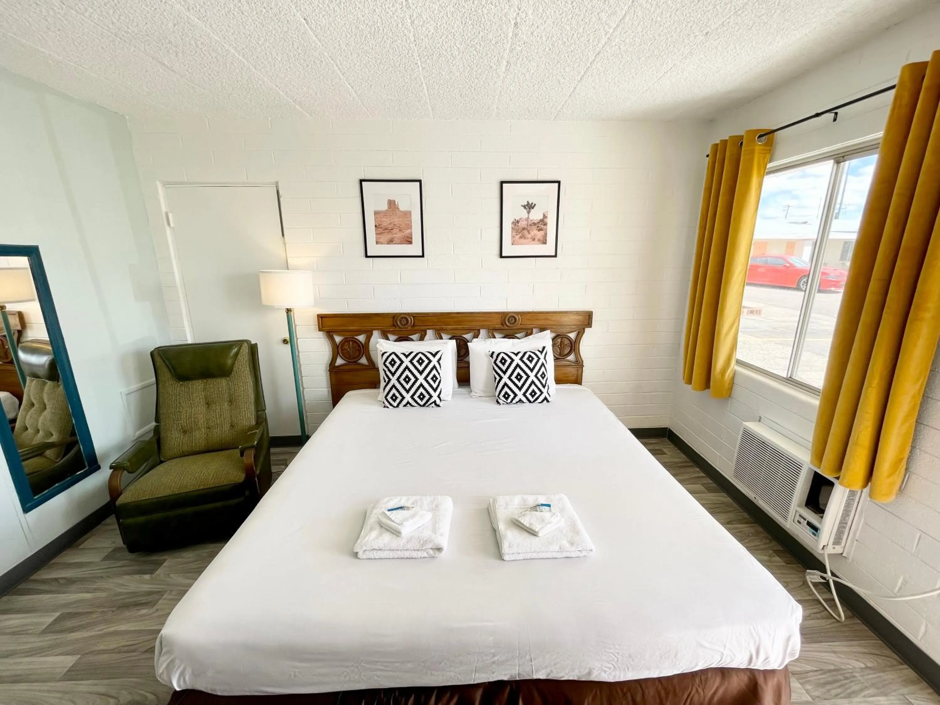 Bed in The Postcard Motel