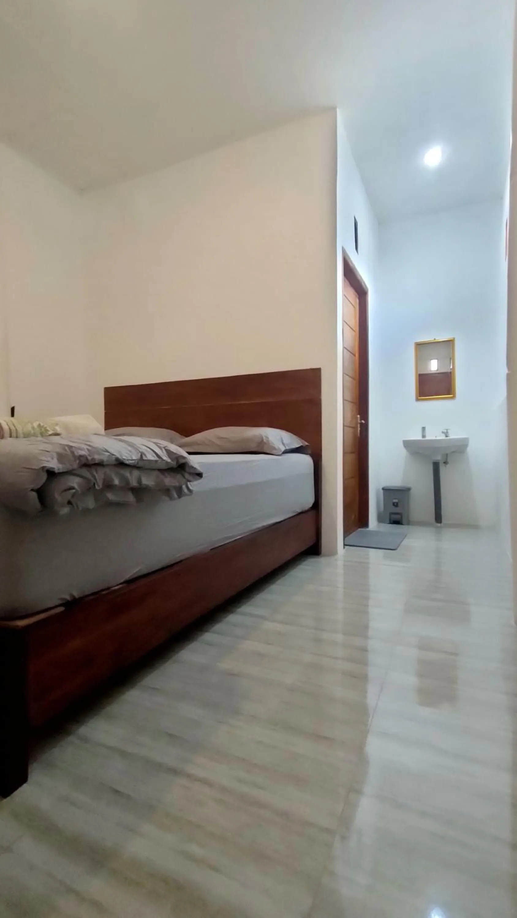 Bed in Angin Mamiri Rinjani Cottages And Restaurant