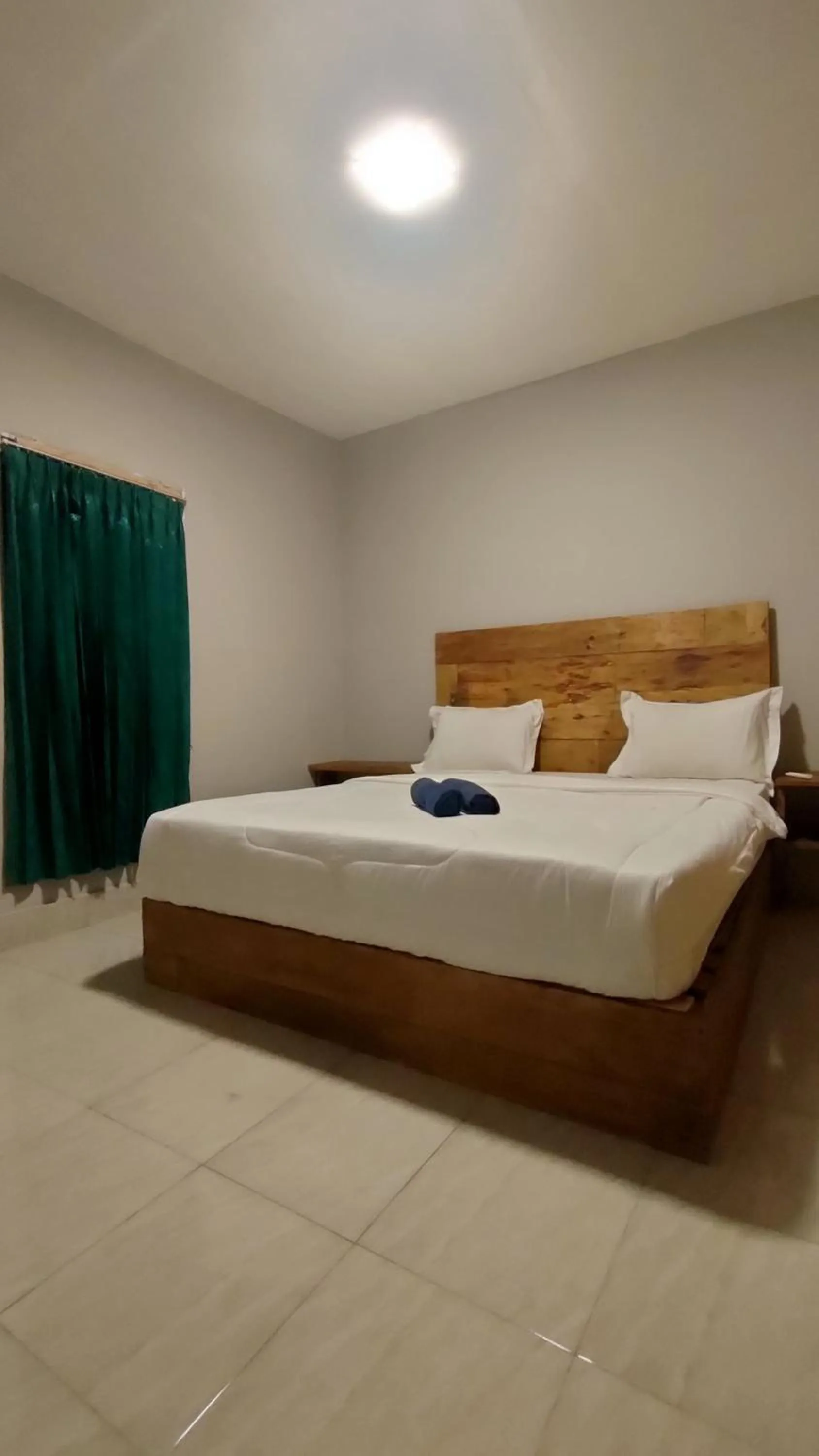 Bed in Angin Mamiri Rinjani Cottages And Restaurant