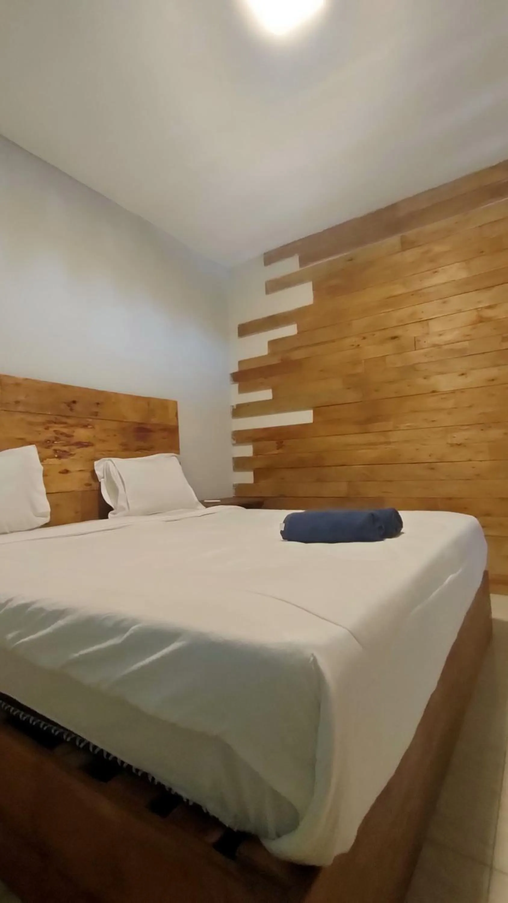 Bed in Angin Mamiri Rinjani Cottages And Restaurant