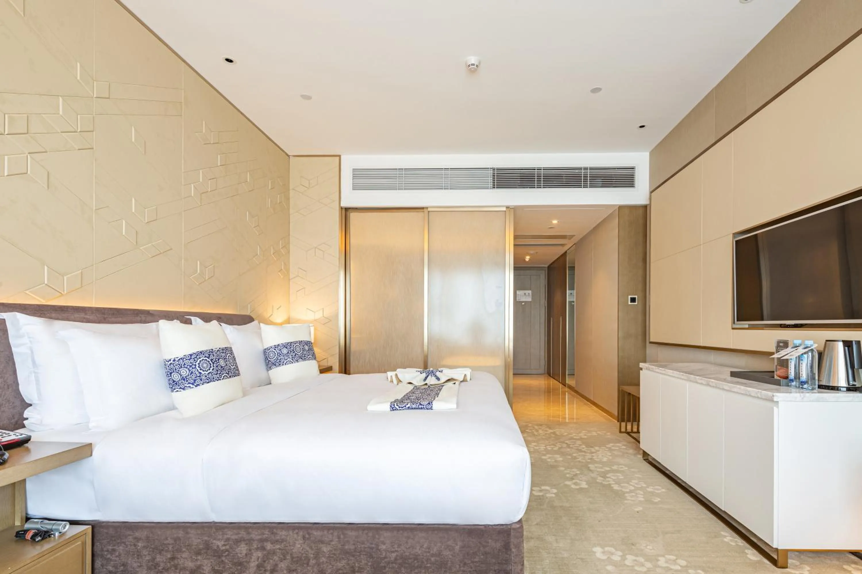 Bed in LIUZHOU PENGYI Hotel