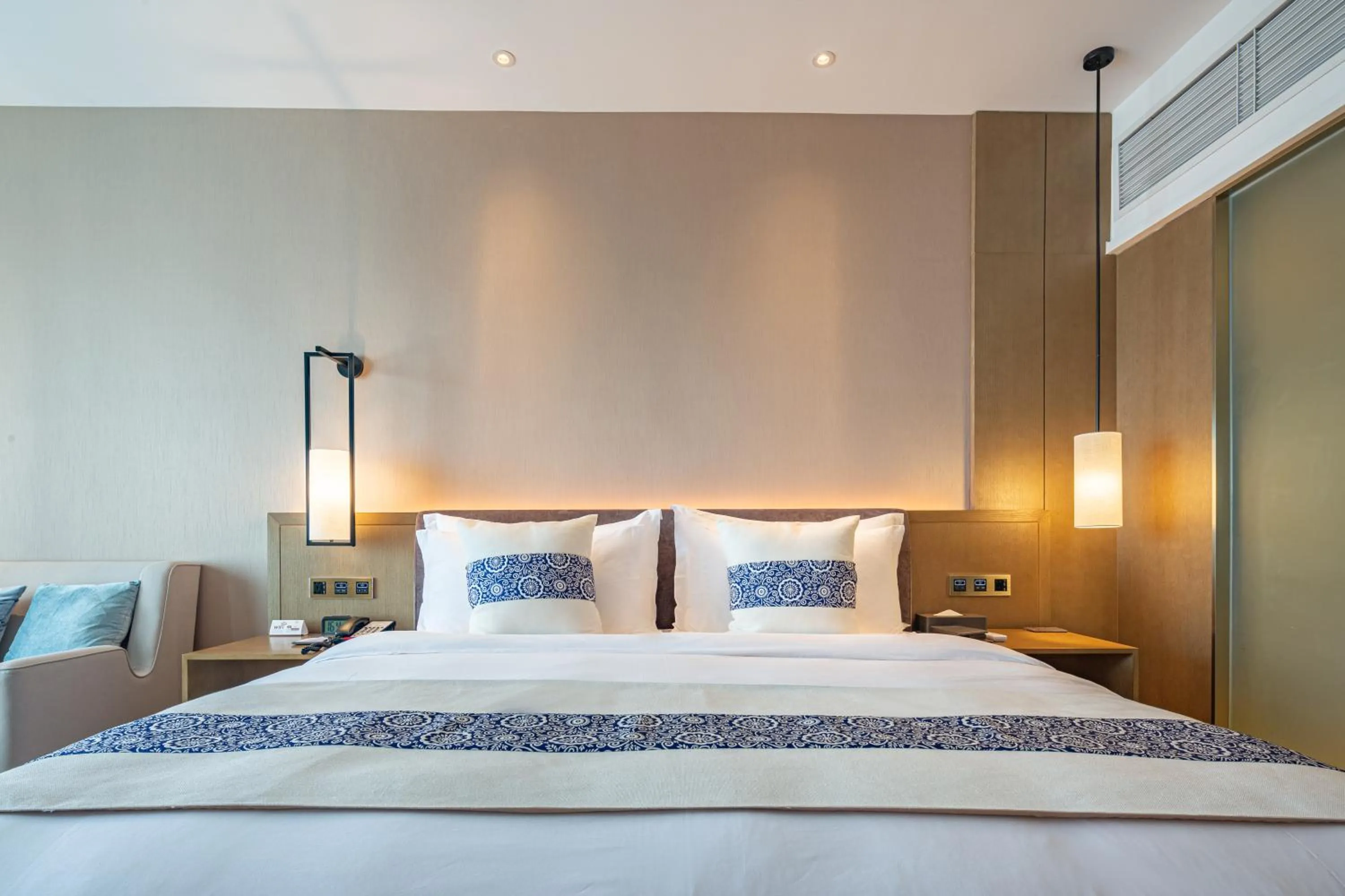 Bed in LIUZHOU PENGYI Hotel