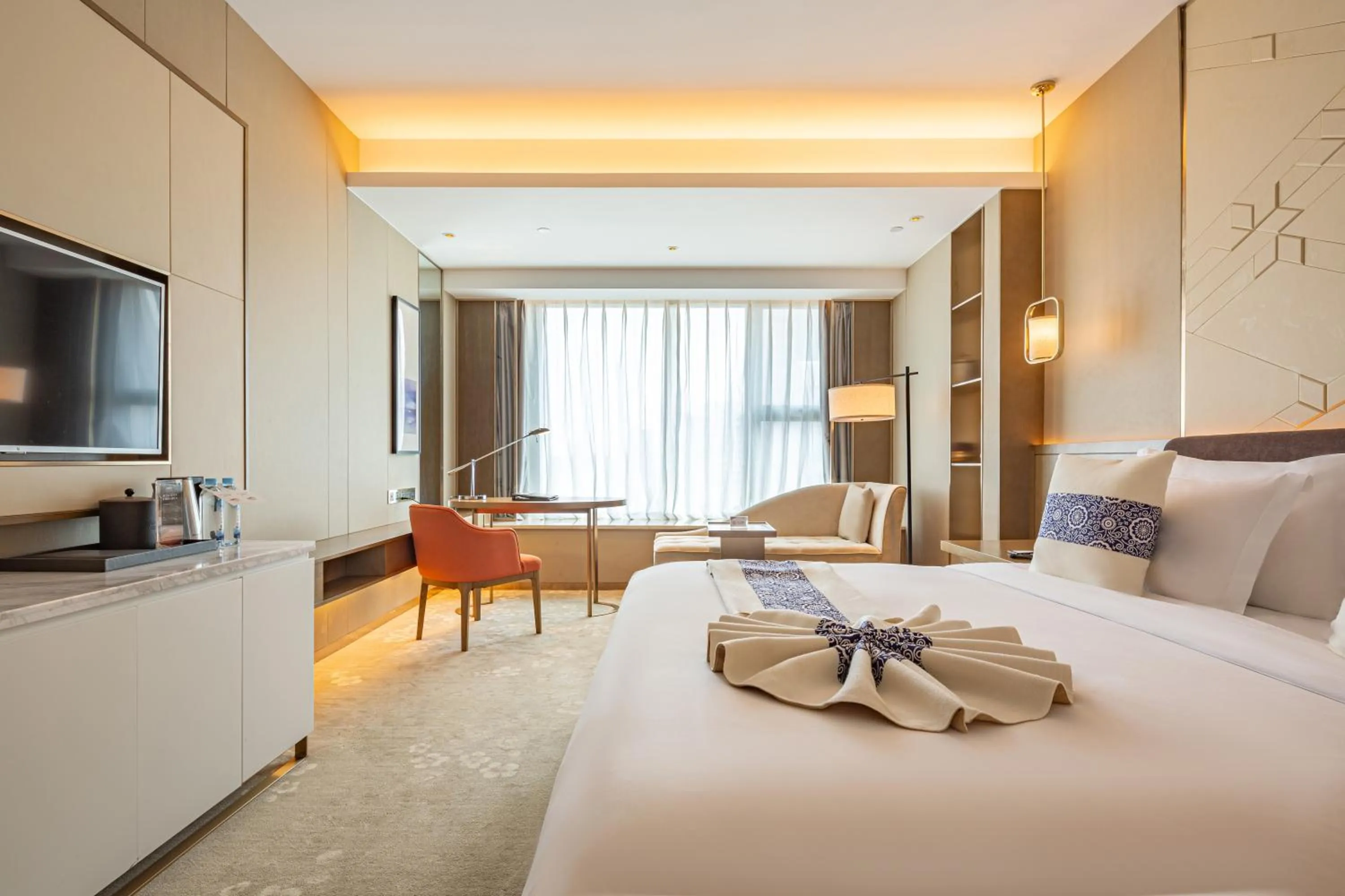 Bed in LIUZHOU PENGYI Hotel