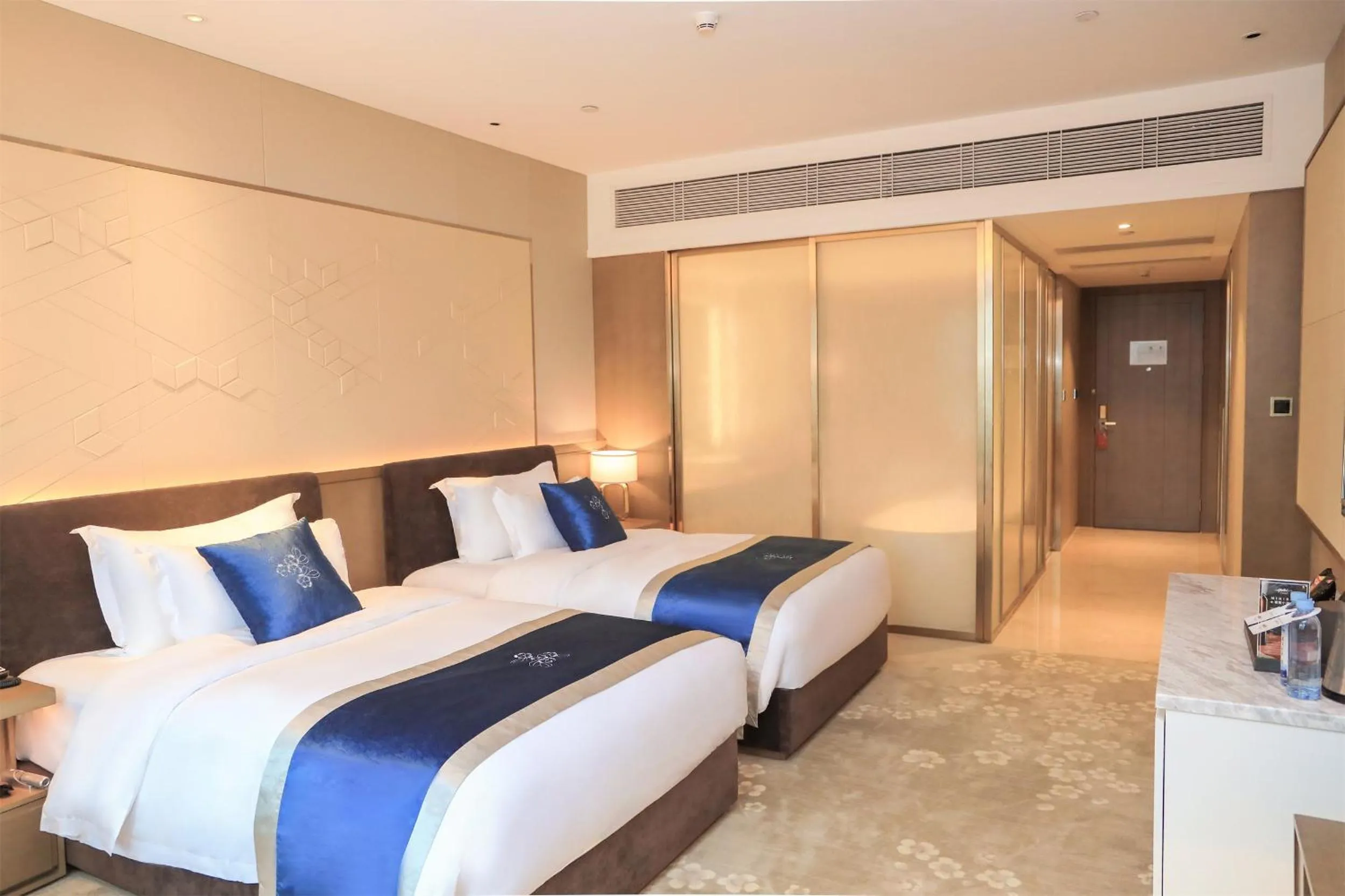 Bed in LIUZHOU PENGYI Hotel