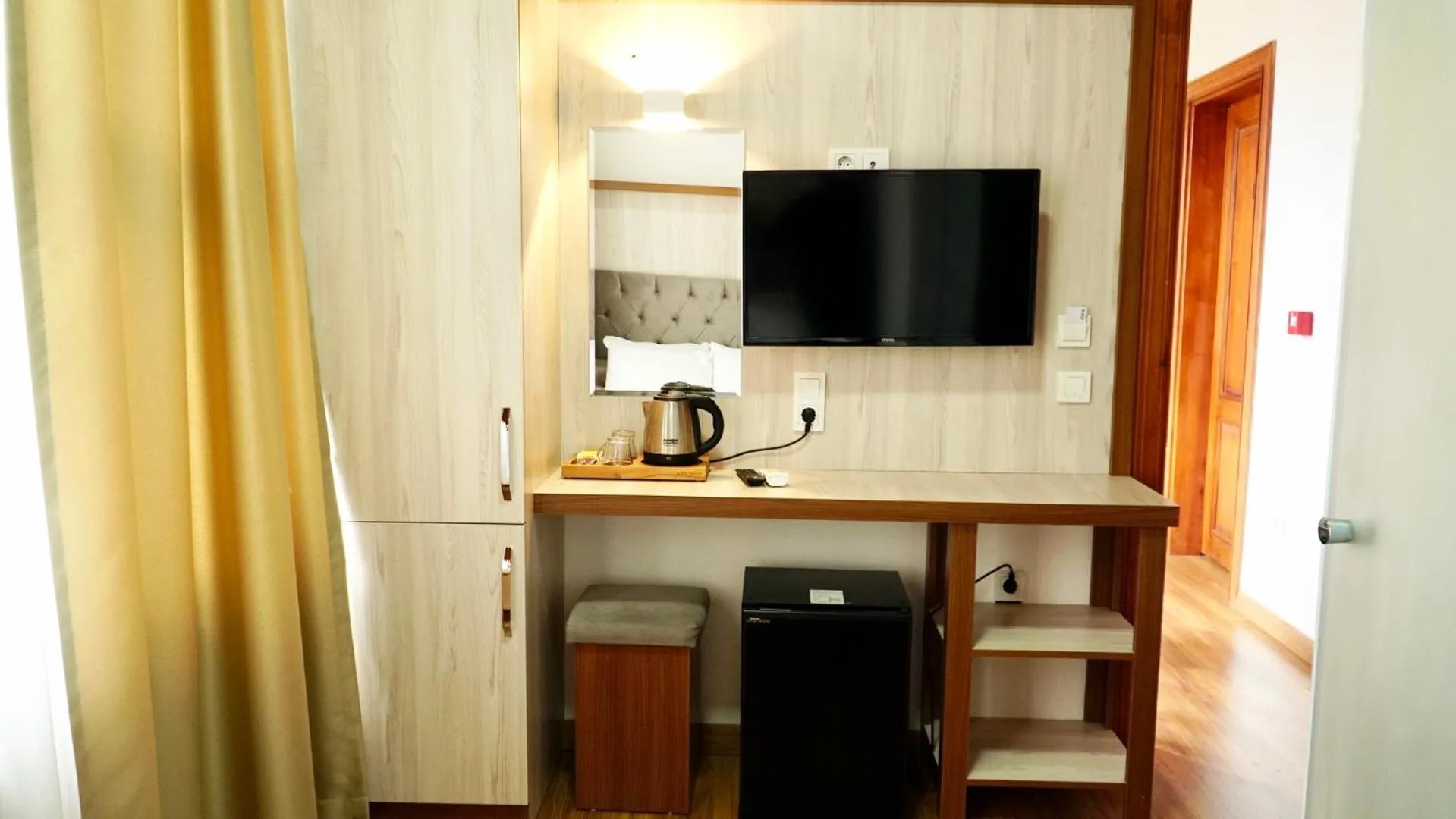 TV and multimedia in QONAQ HOTEL & SUITES