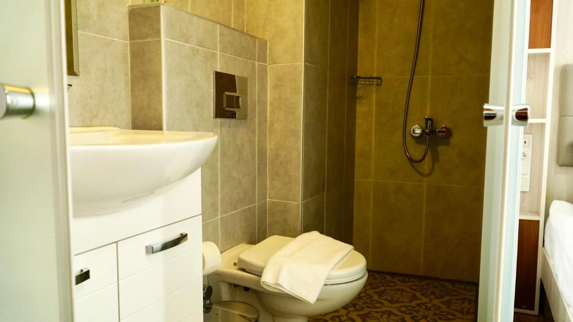 Bathroom in QONAQ HOTEL & SUITES