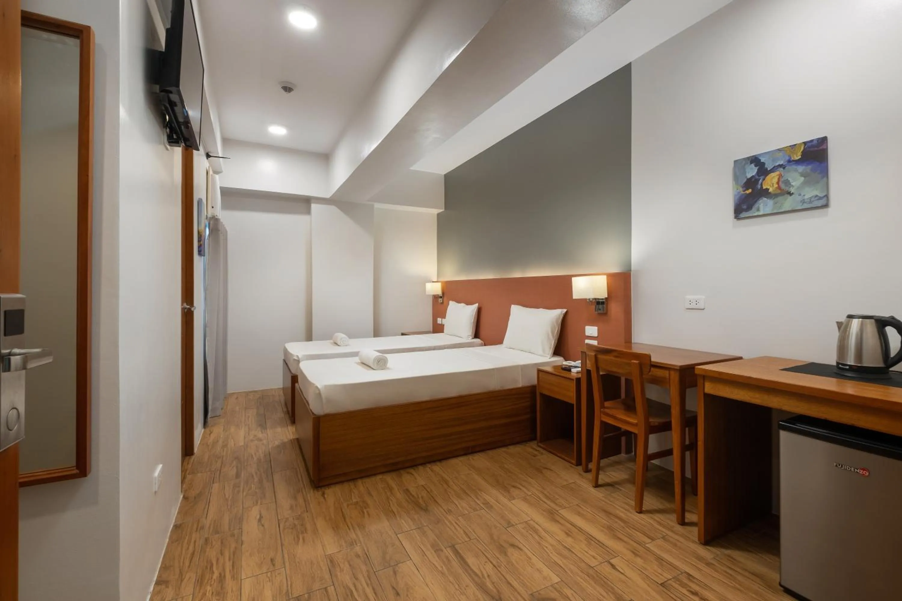 Bedroom, Bed in iHotel Uptown BGC