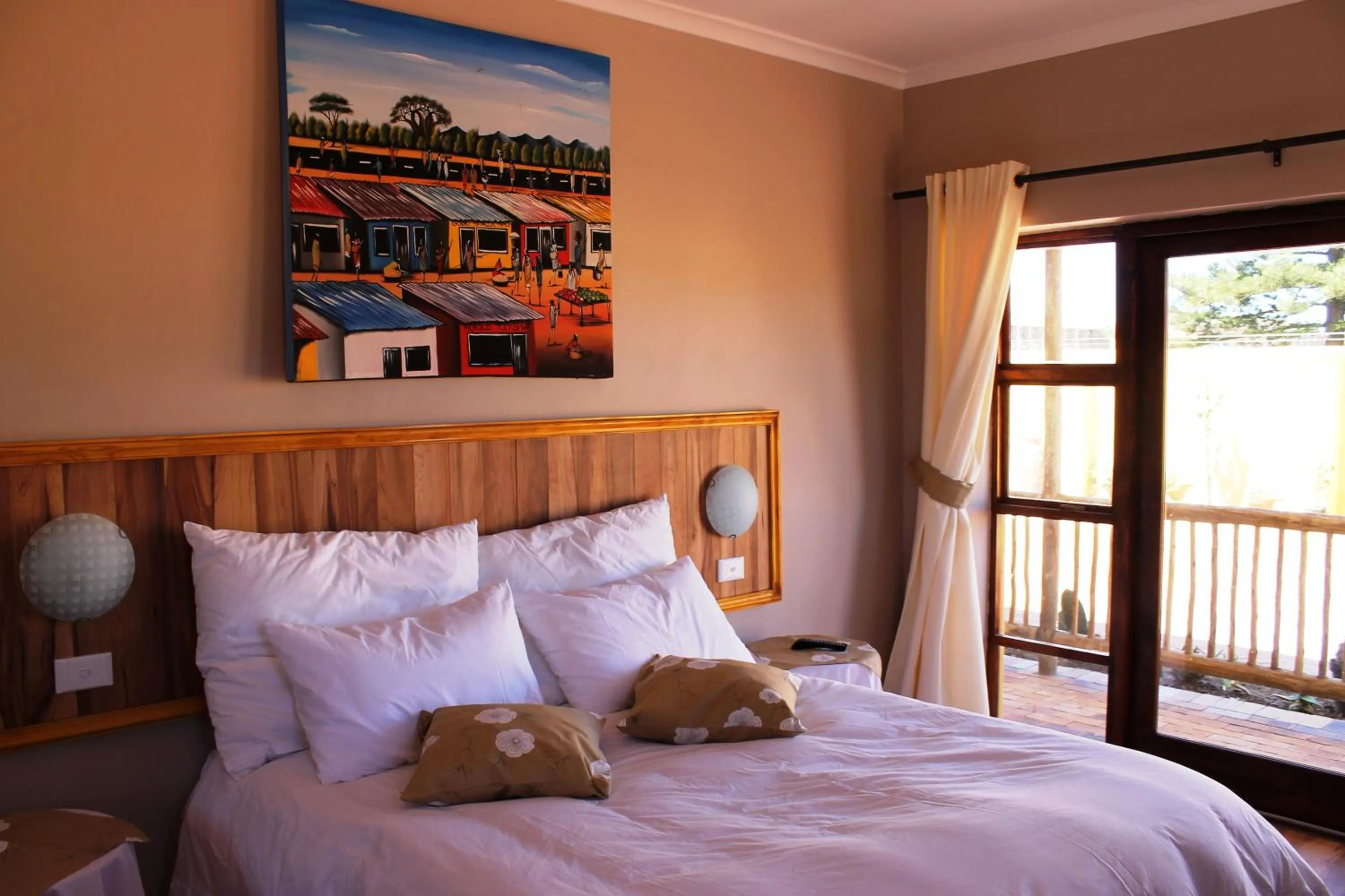 Bed in Flintstones Guest House Cape Town