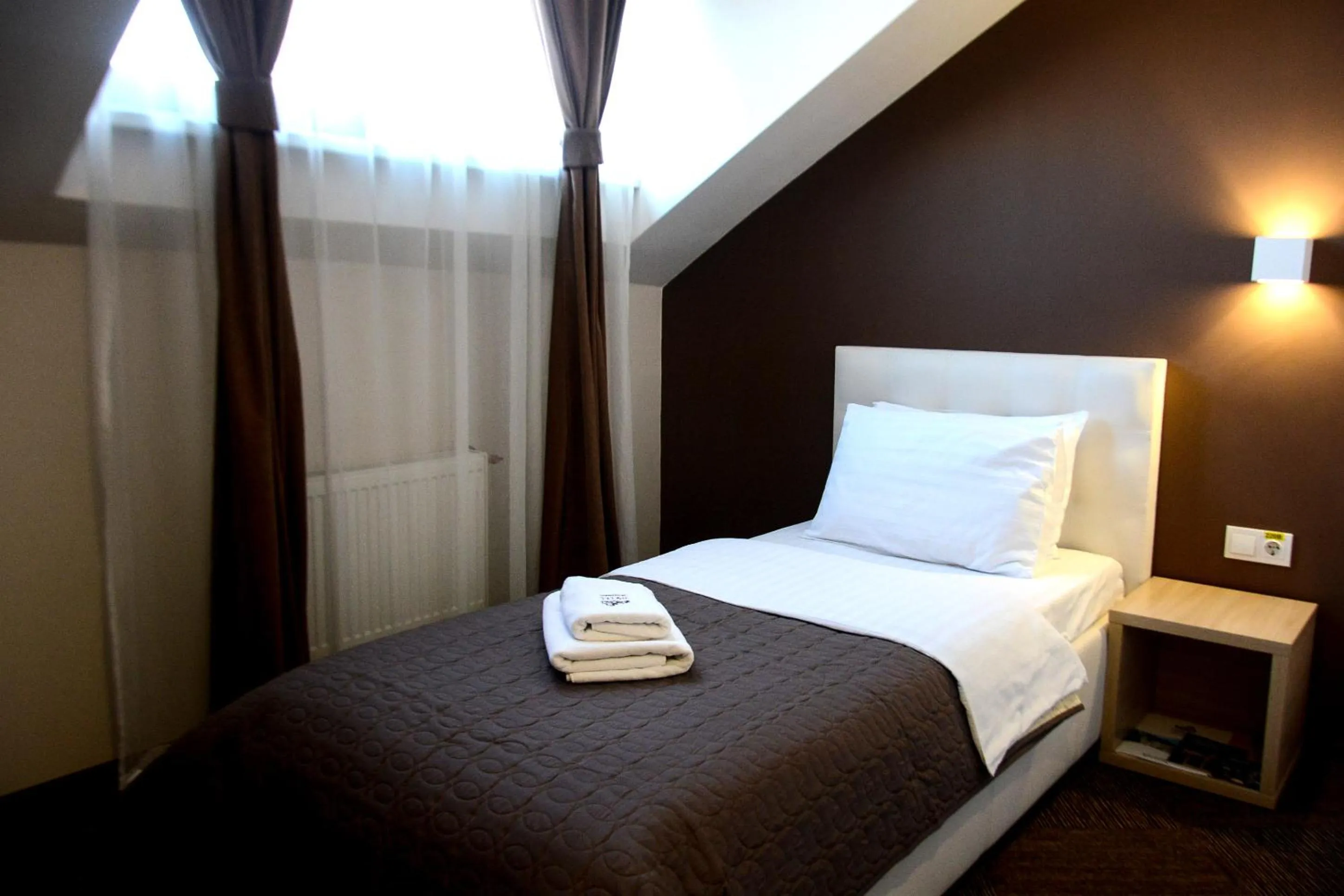 Bed in Hotel Voskresensky