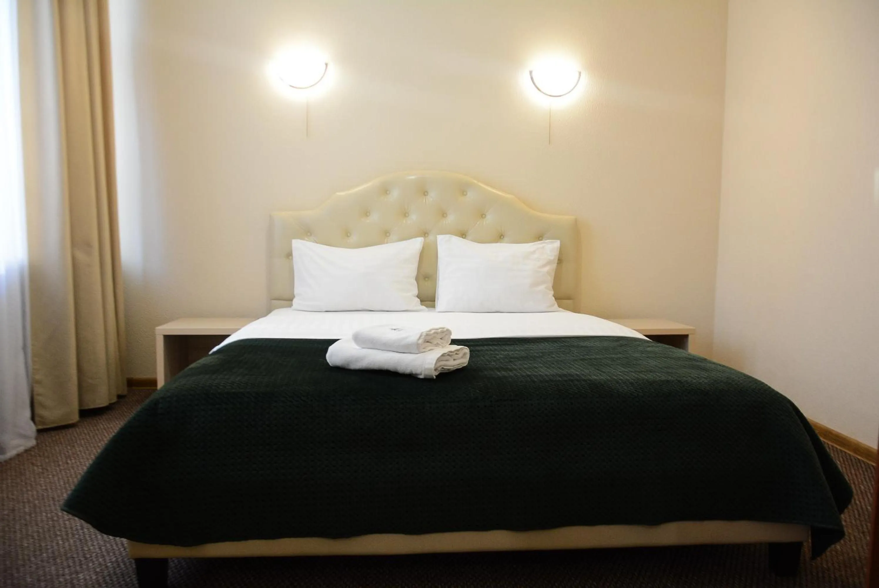 Bed in Hotel Voskresensky