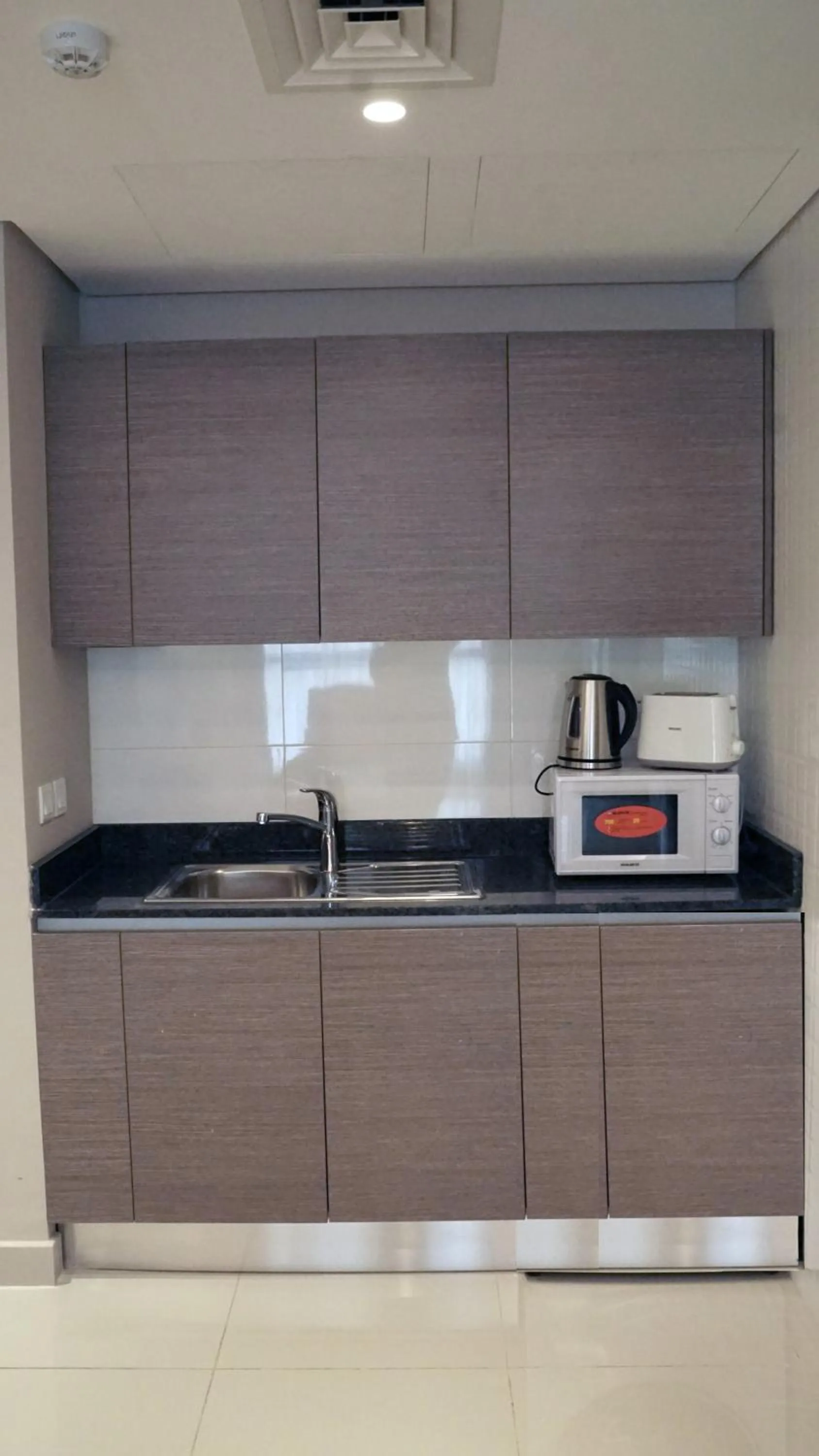 Kitchen or kitchenette in Sunday Luxury Downtown Adliya Formerly Jewel Hotel