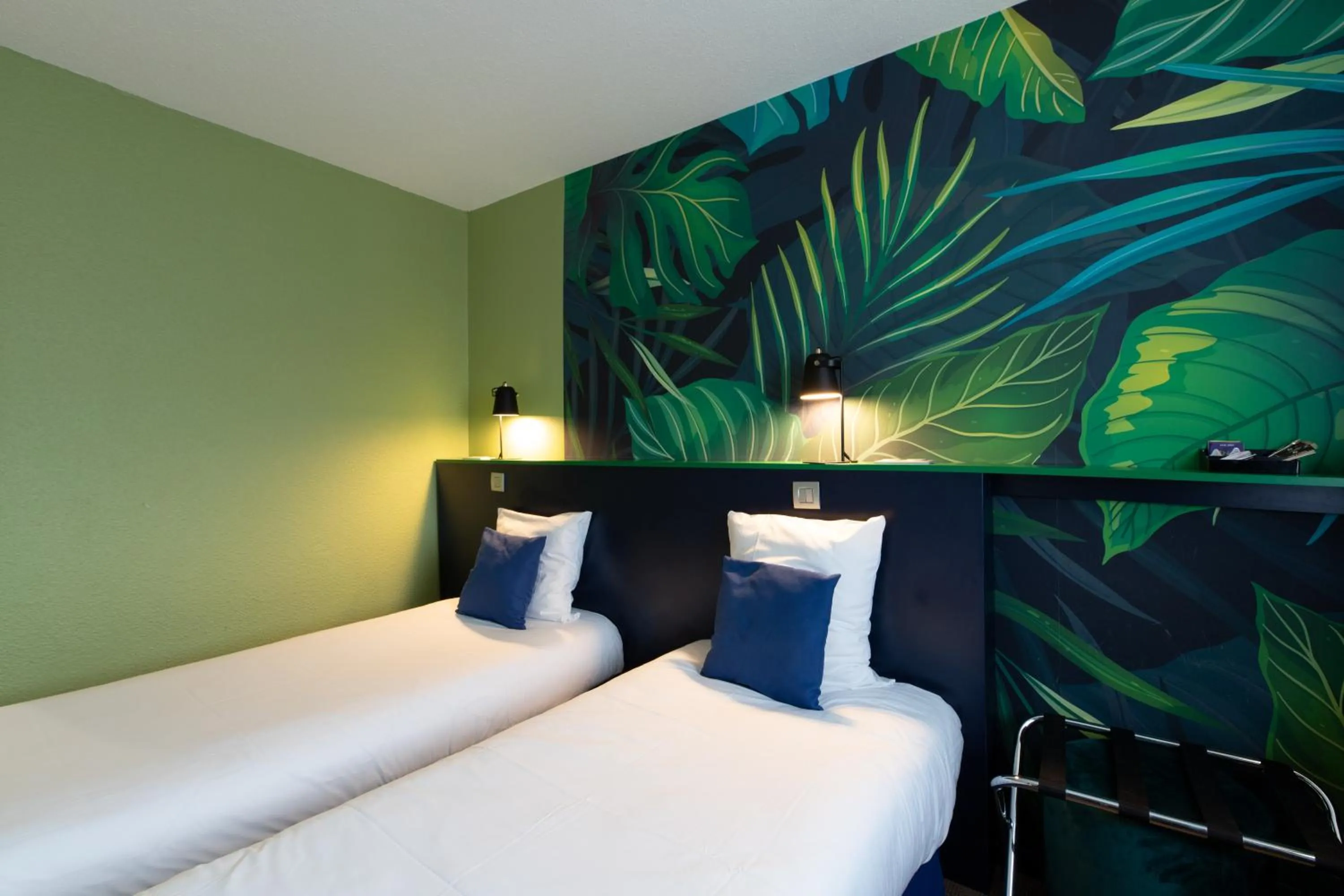 Bed in Logis Hôtel du Haut-Bugey