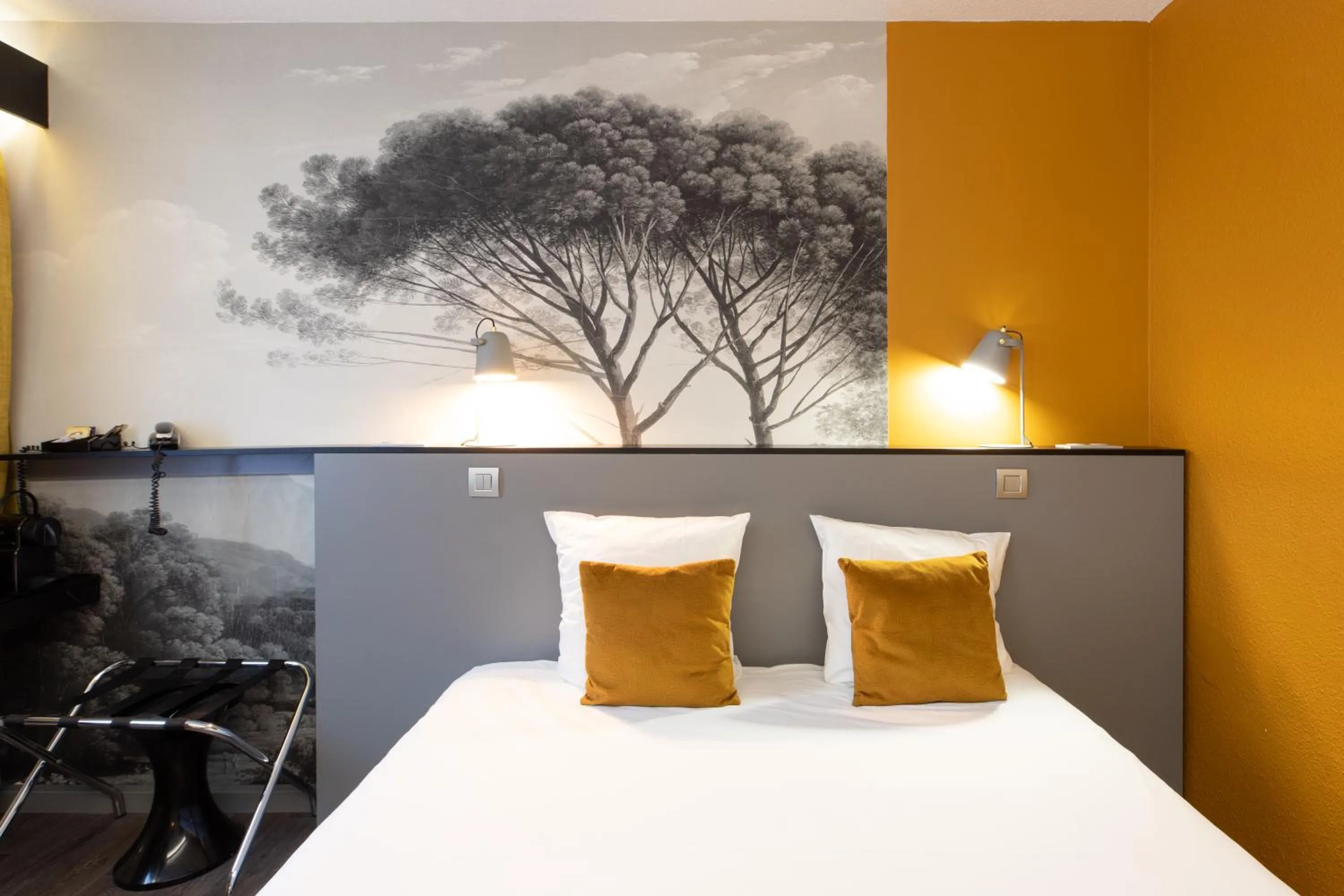 Bed in Logis Hôtel du Haut-Bugey