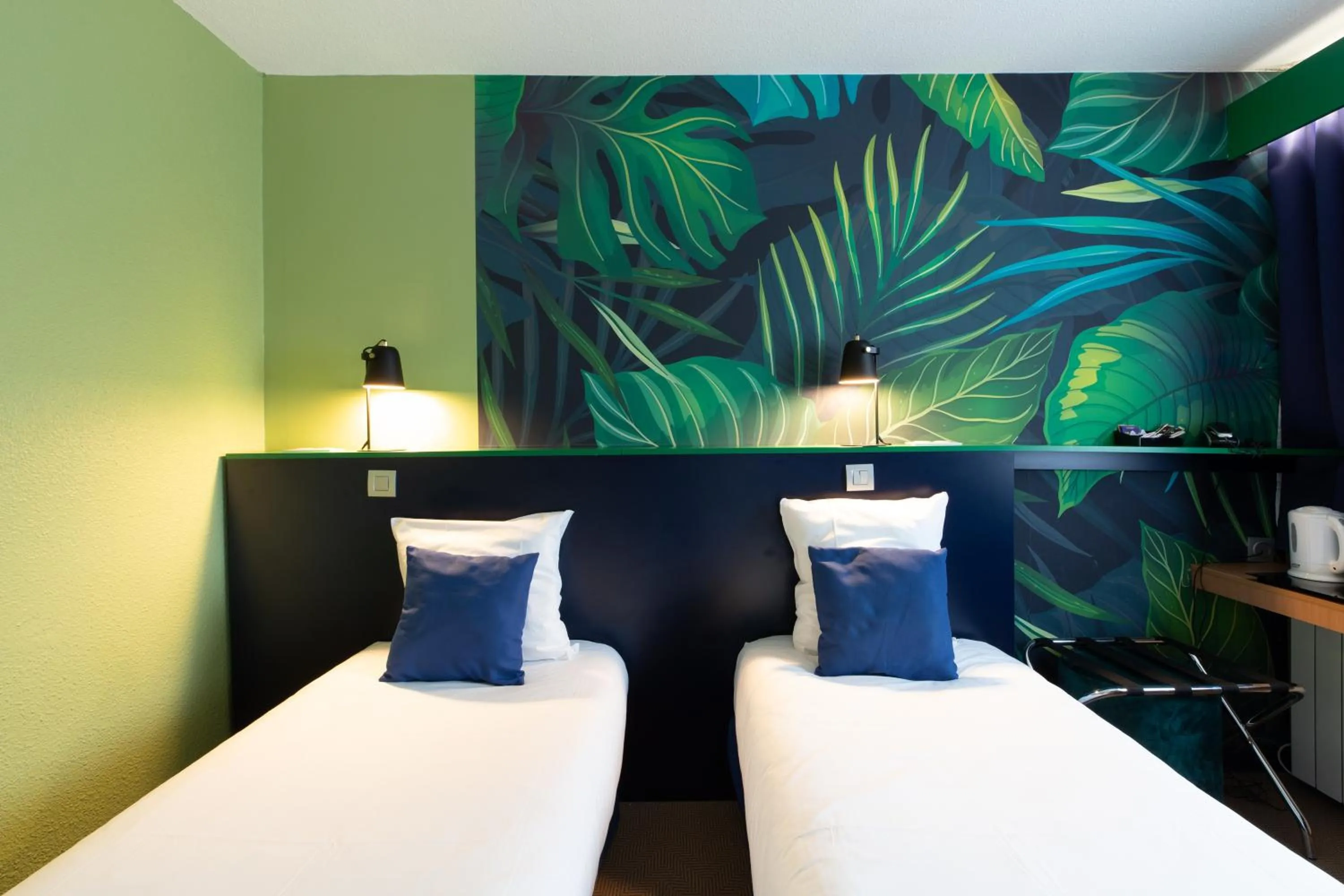 Bed in Logis Hôtel du Haut-Bugey