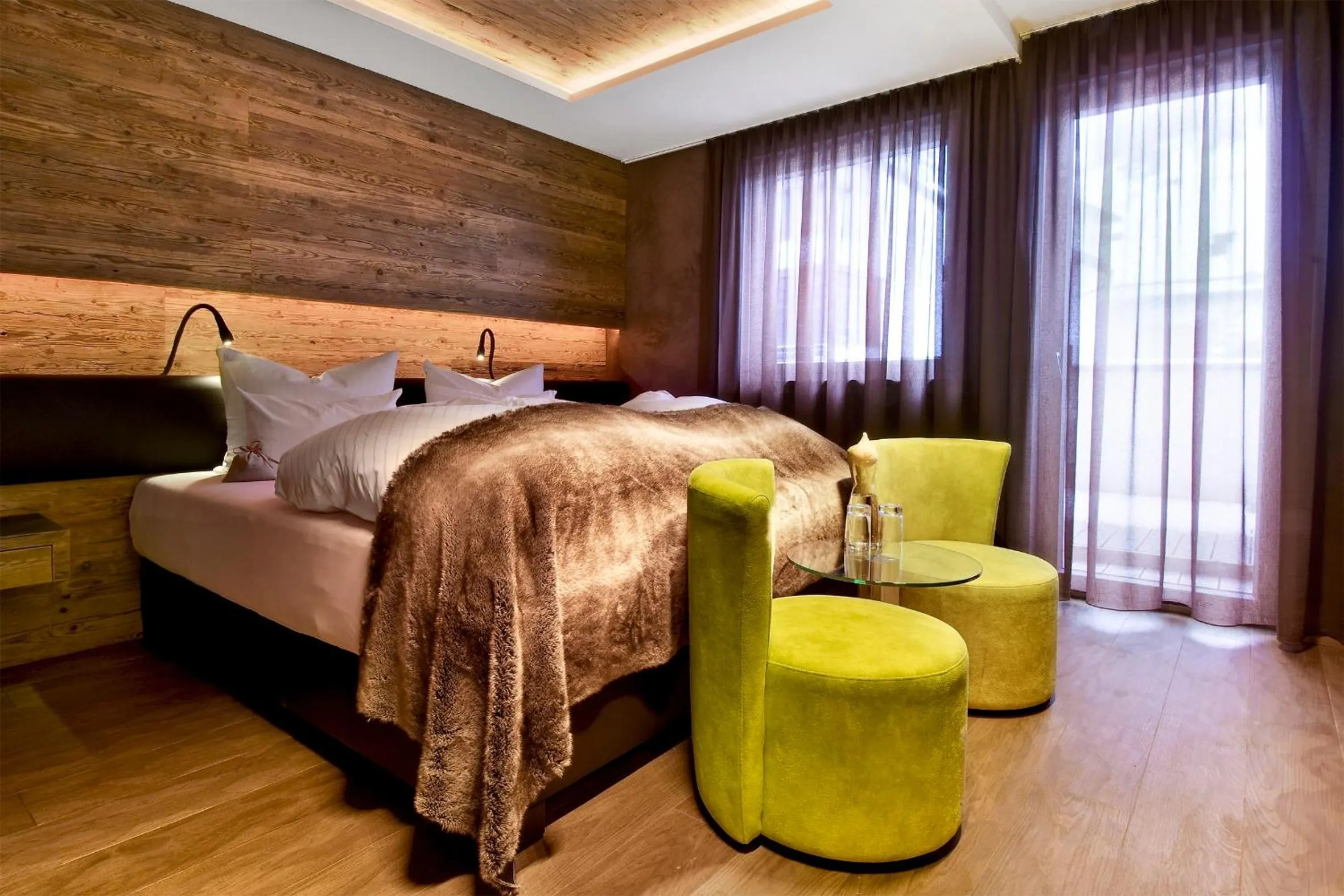 Bed in PETE Alpine Boutique Hotel - klein und fein - Private SPA Suiten und Zimmer