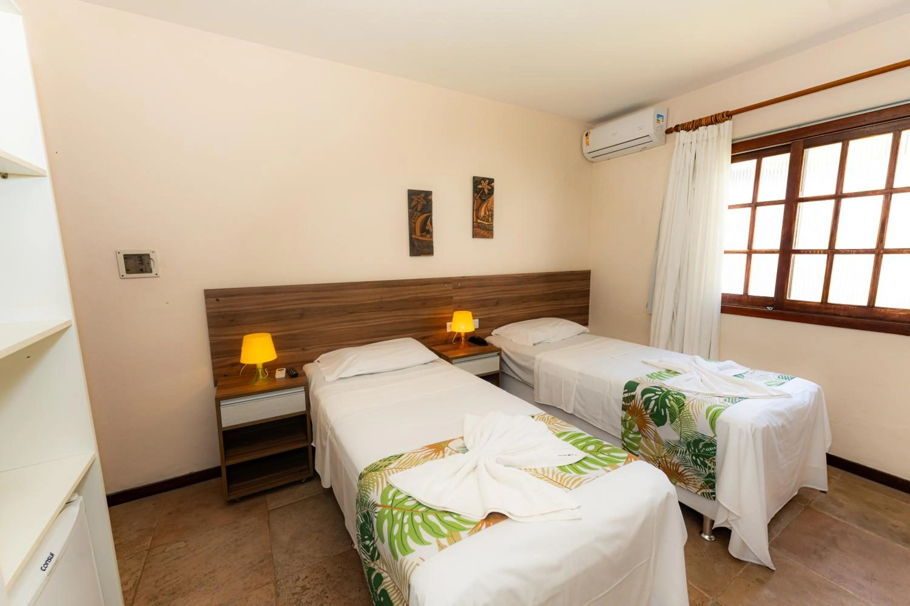 Bed in Hotel Pousada Salvador Paradise