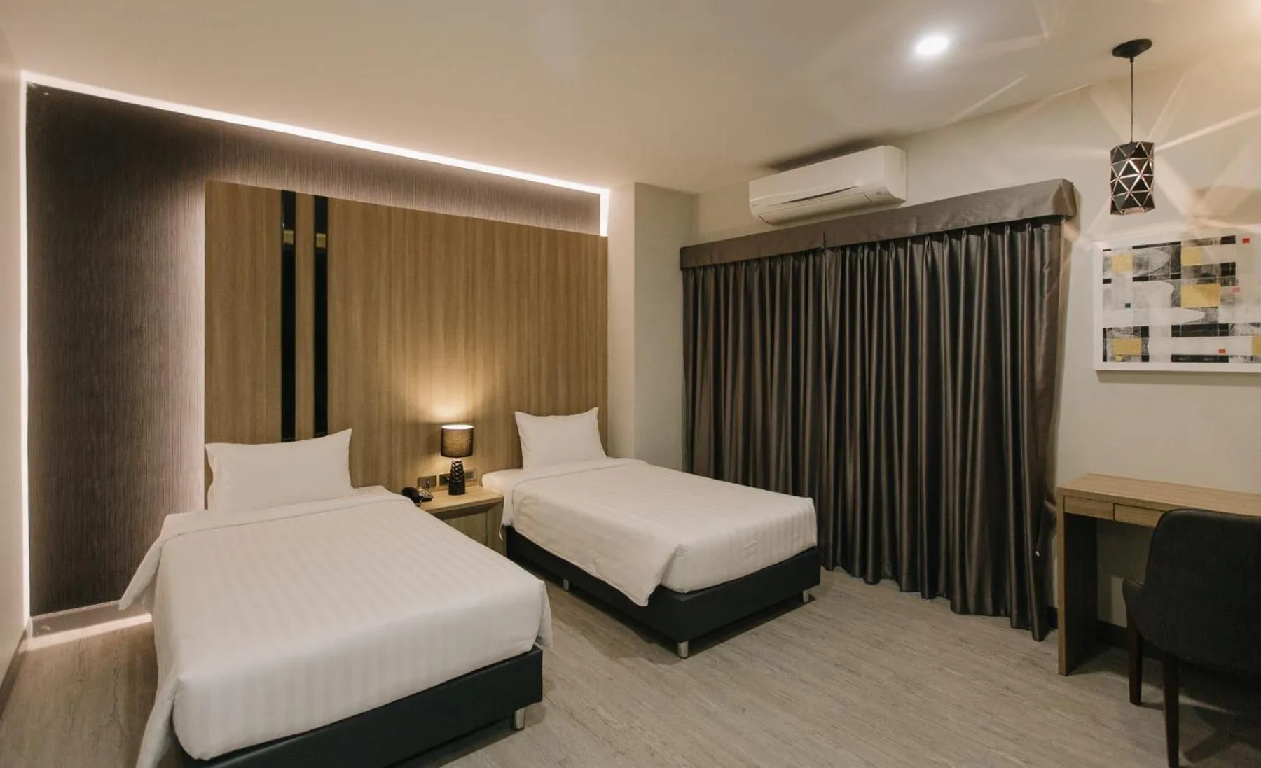Bed in Arista Hotel Ubon