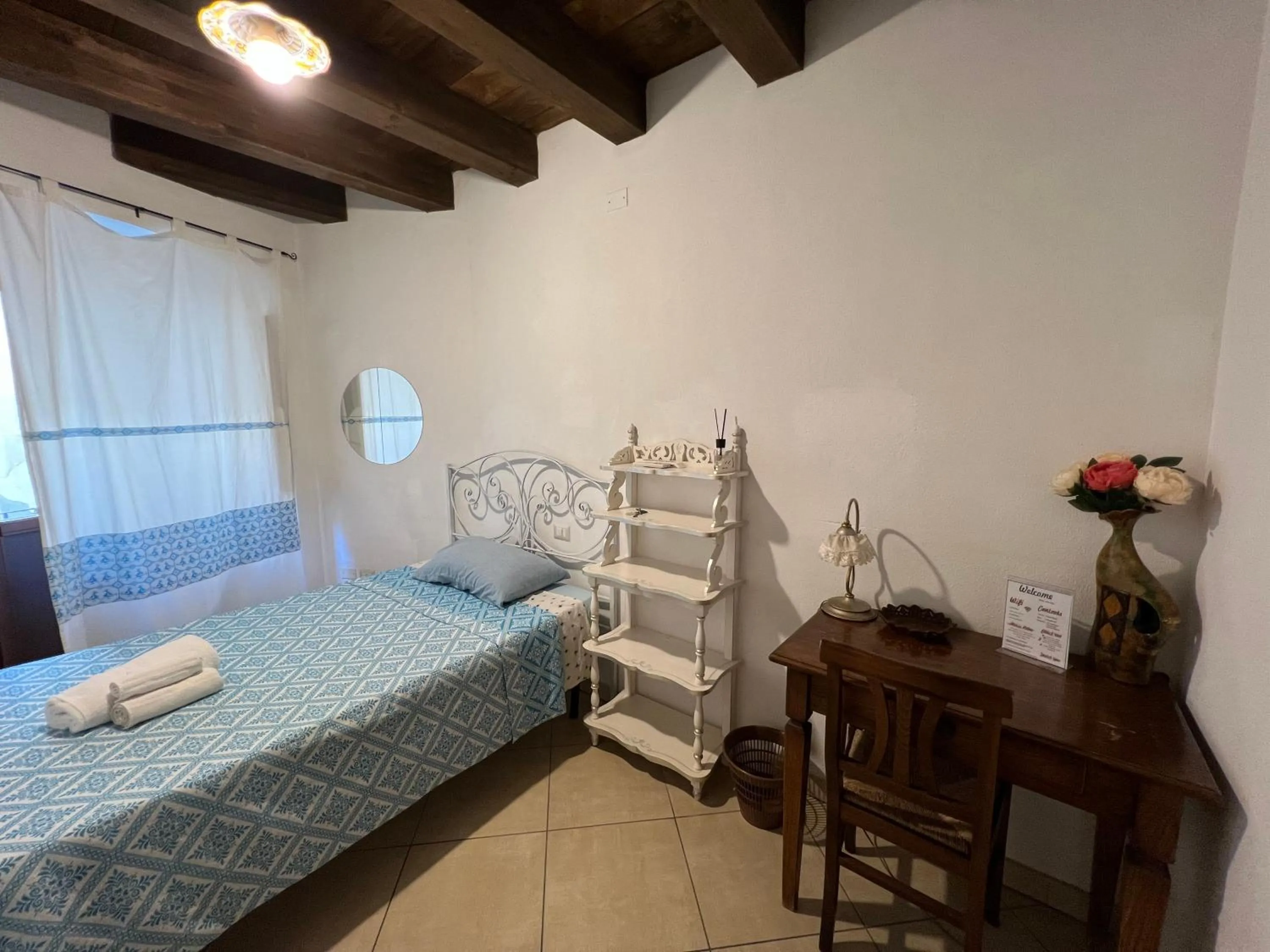 Bed in L'Antica Torre Caralis Holiday