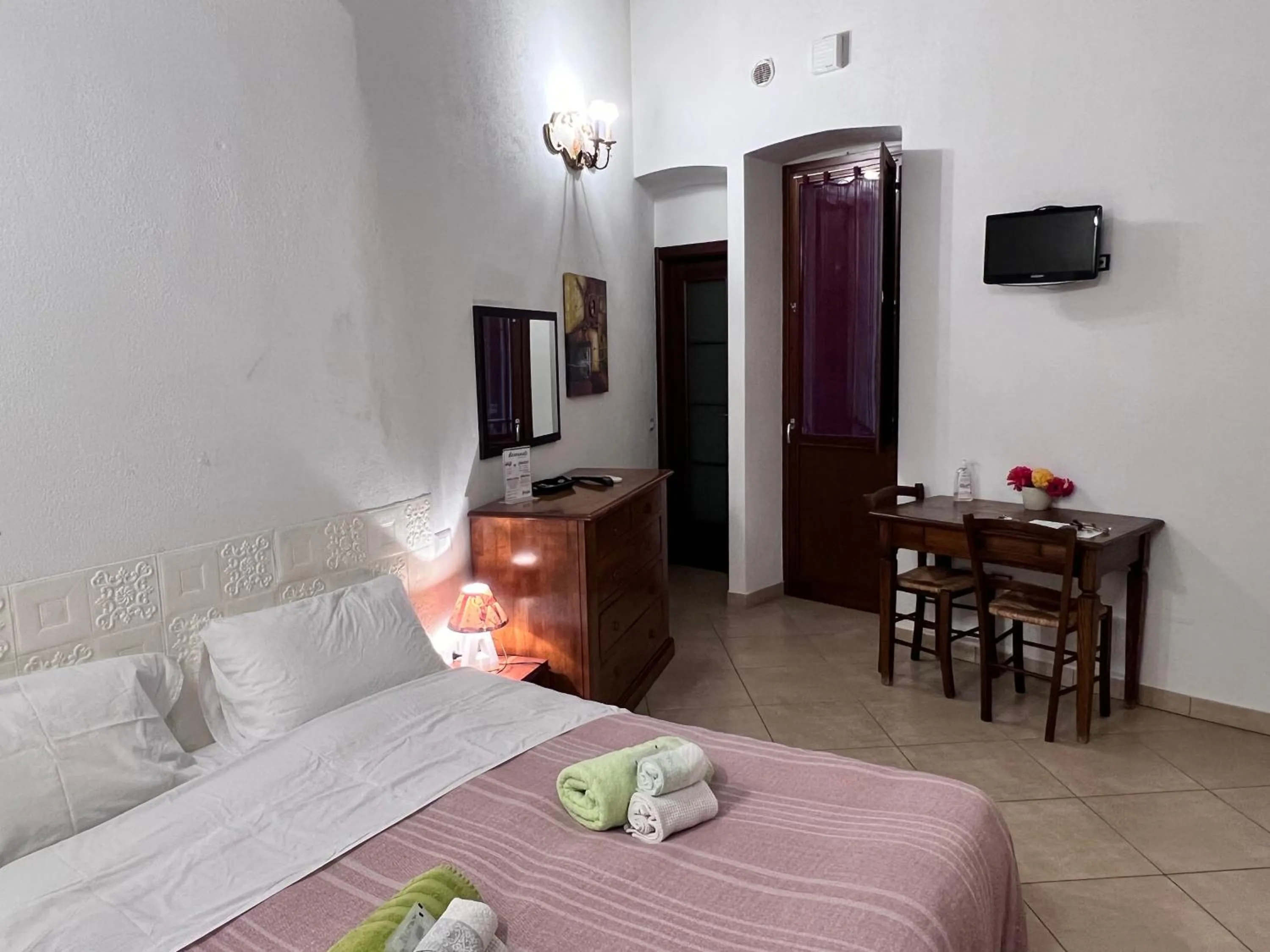 Bed in L'Antica Torre Caralis Holiday