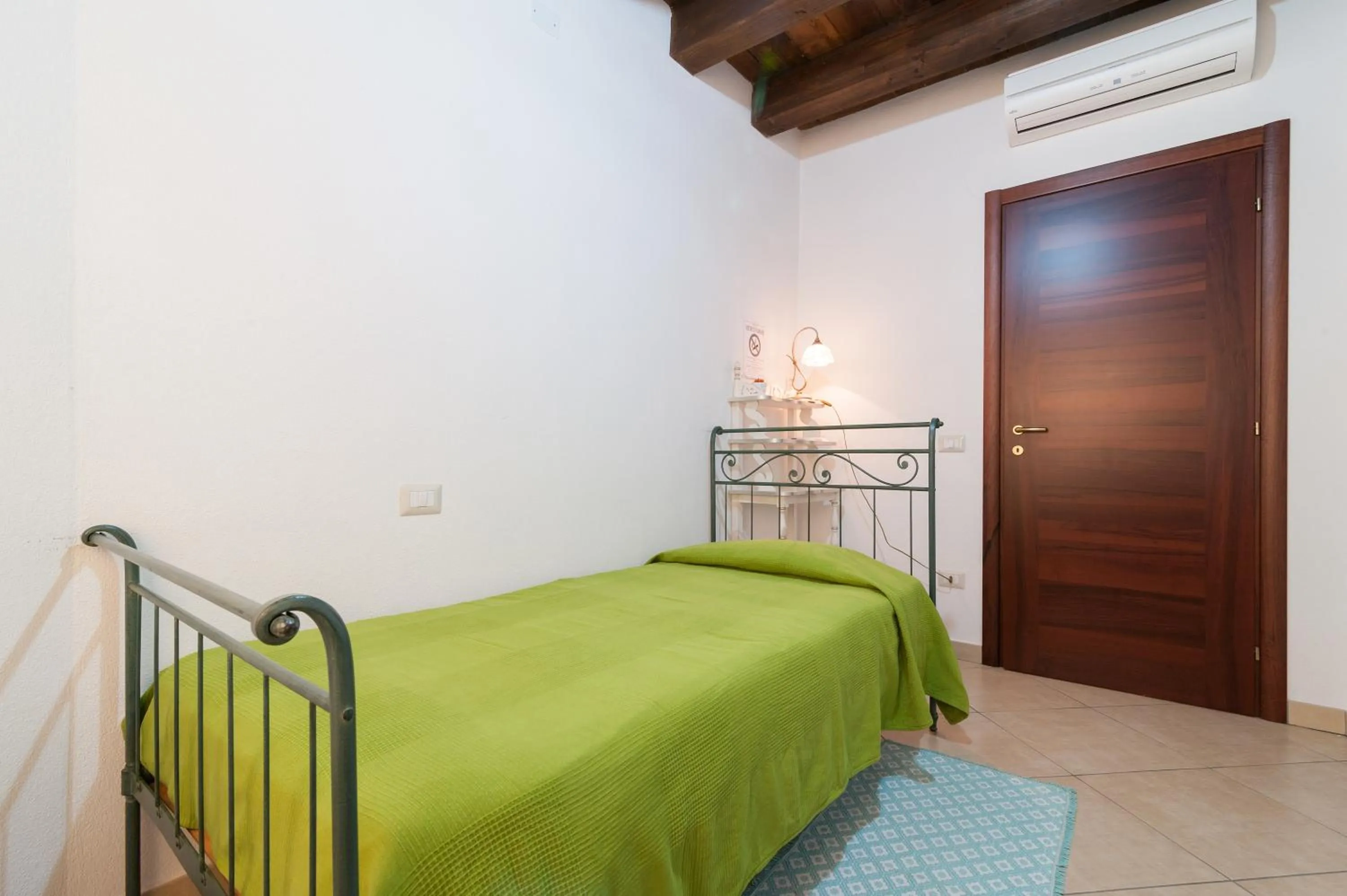 Photo of the whole room, Bed in L'Antica Torre Caralis Holiday