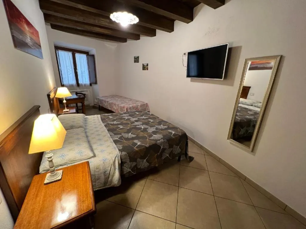Bed in L'Antica Torre Caralis Holiday