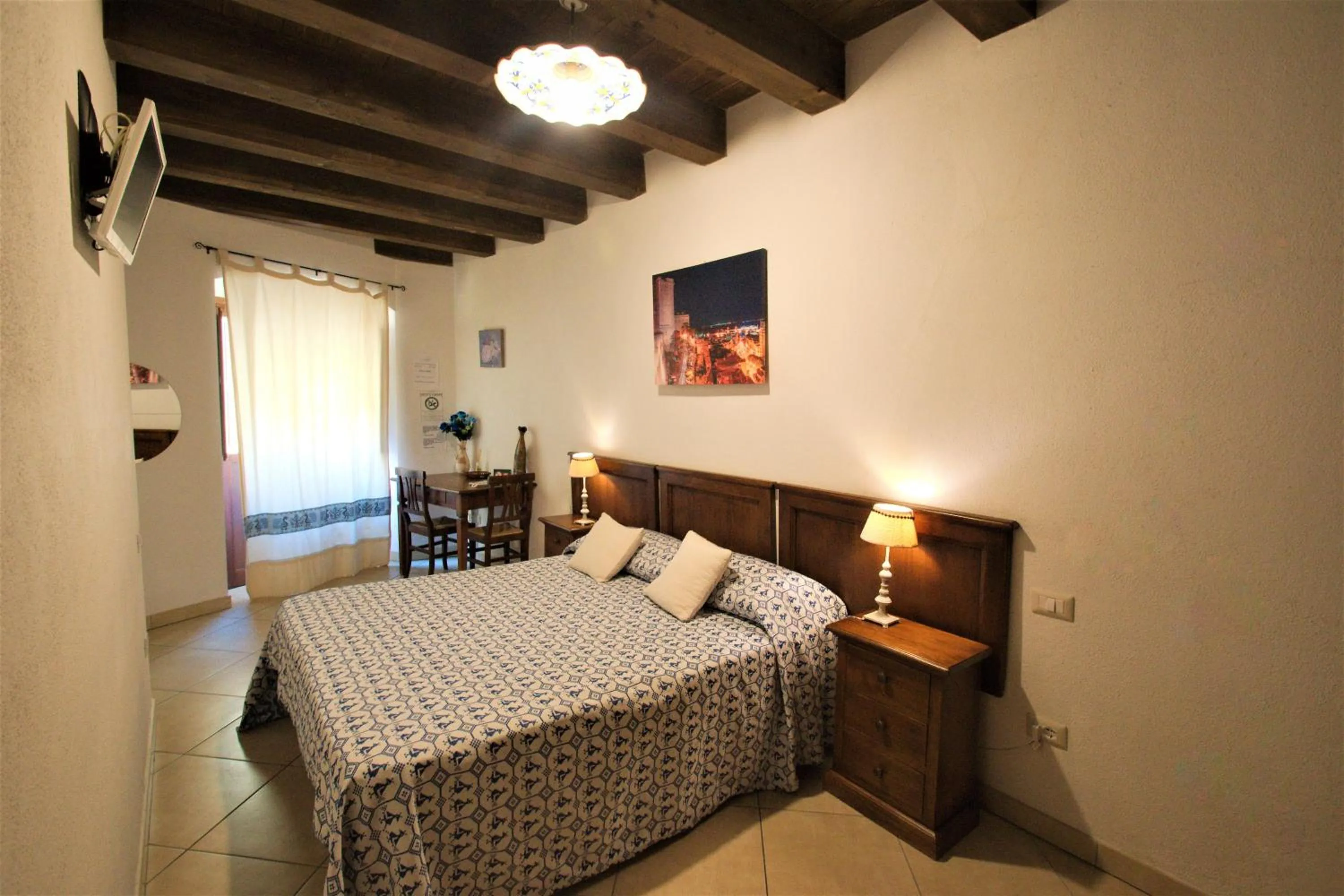 Bed in L'Antica Torre Caralis Holiday
