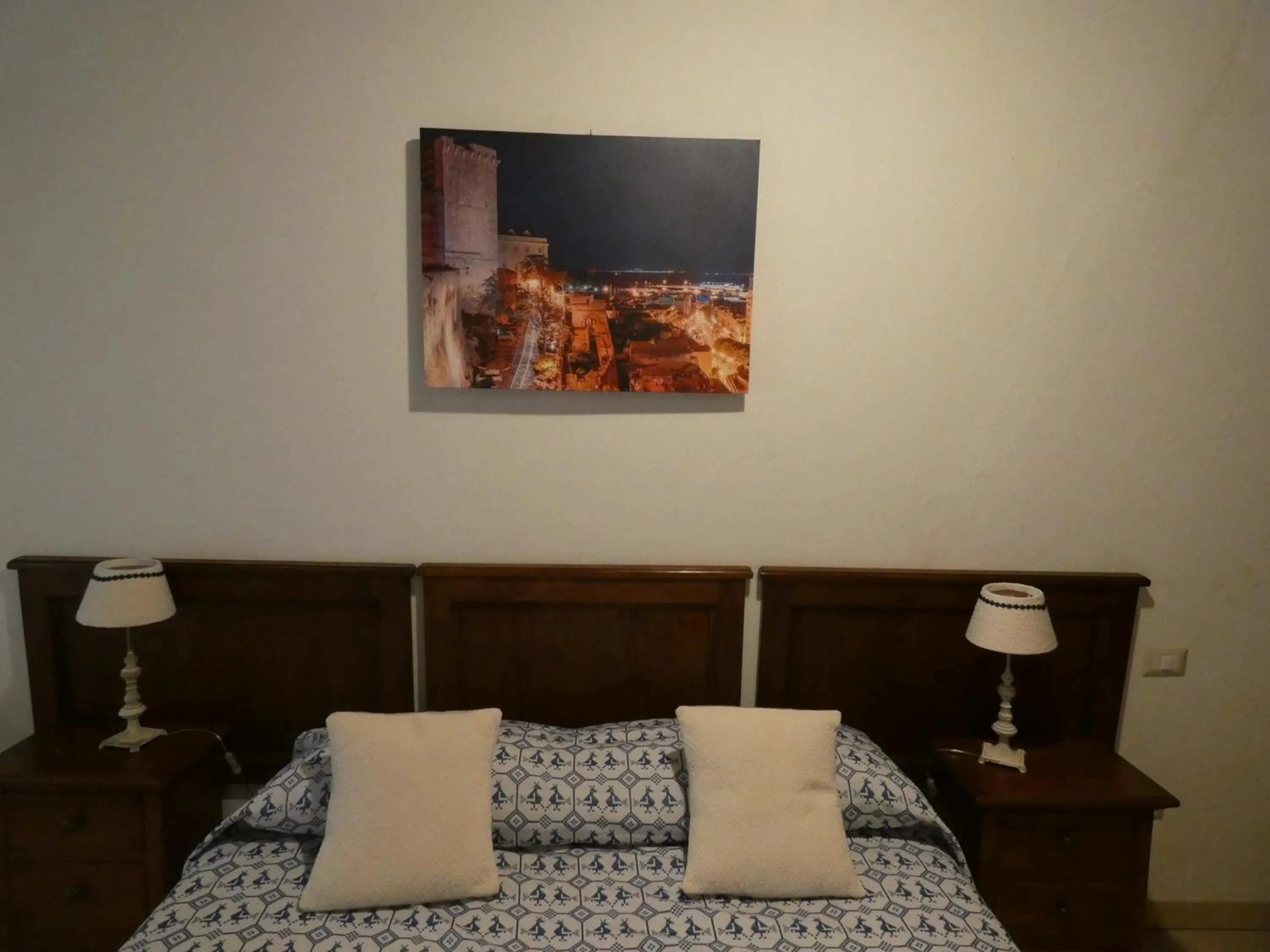 Bed in L'Antica Torre Caralis Holiday