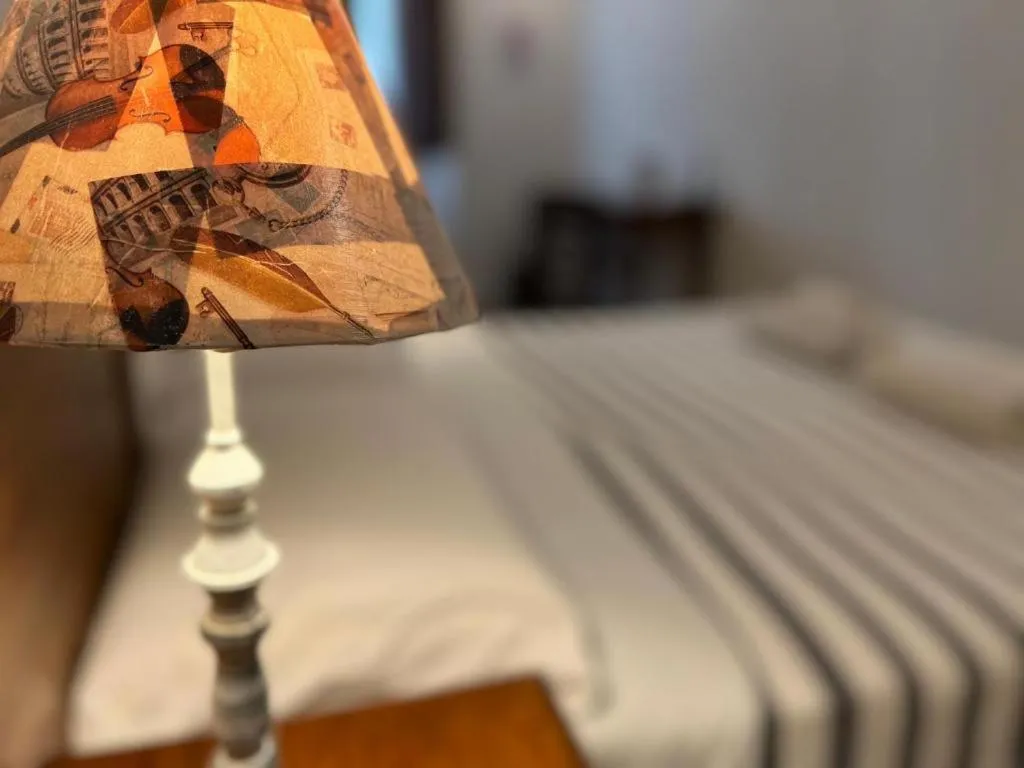 Bed in L'Antica Torre Caralis Holiday