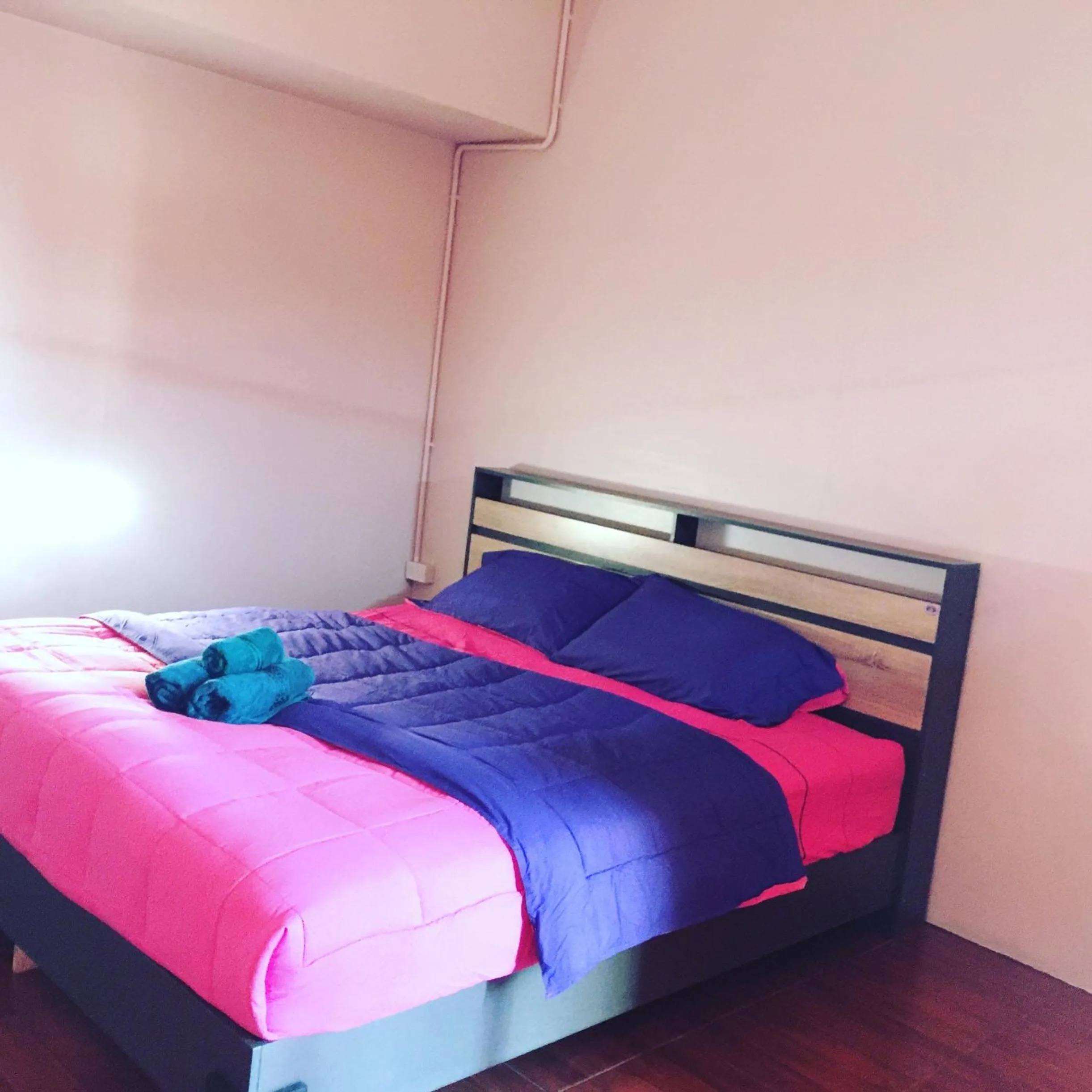 Bed in SMILE HOME GUESTHOUSE