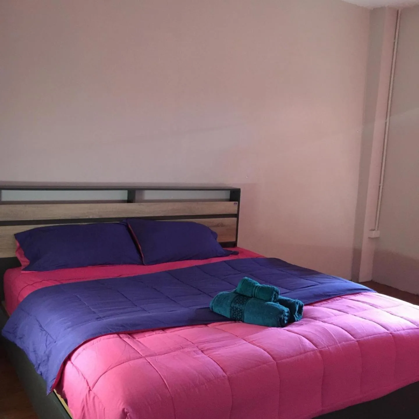 Bed in SMILE HOME GUESTHOUSE