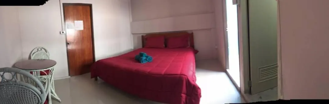 Bed in SMILE HOME GUESTHOUSE