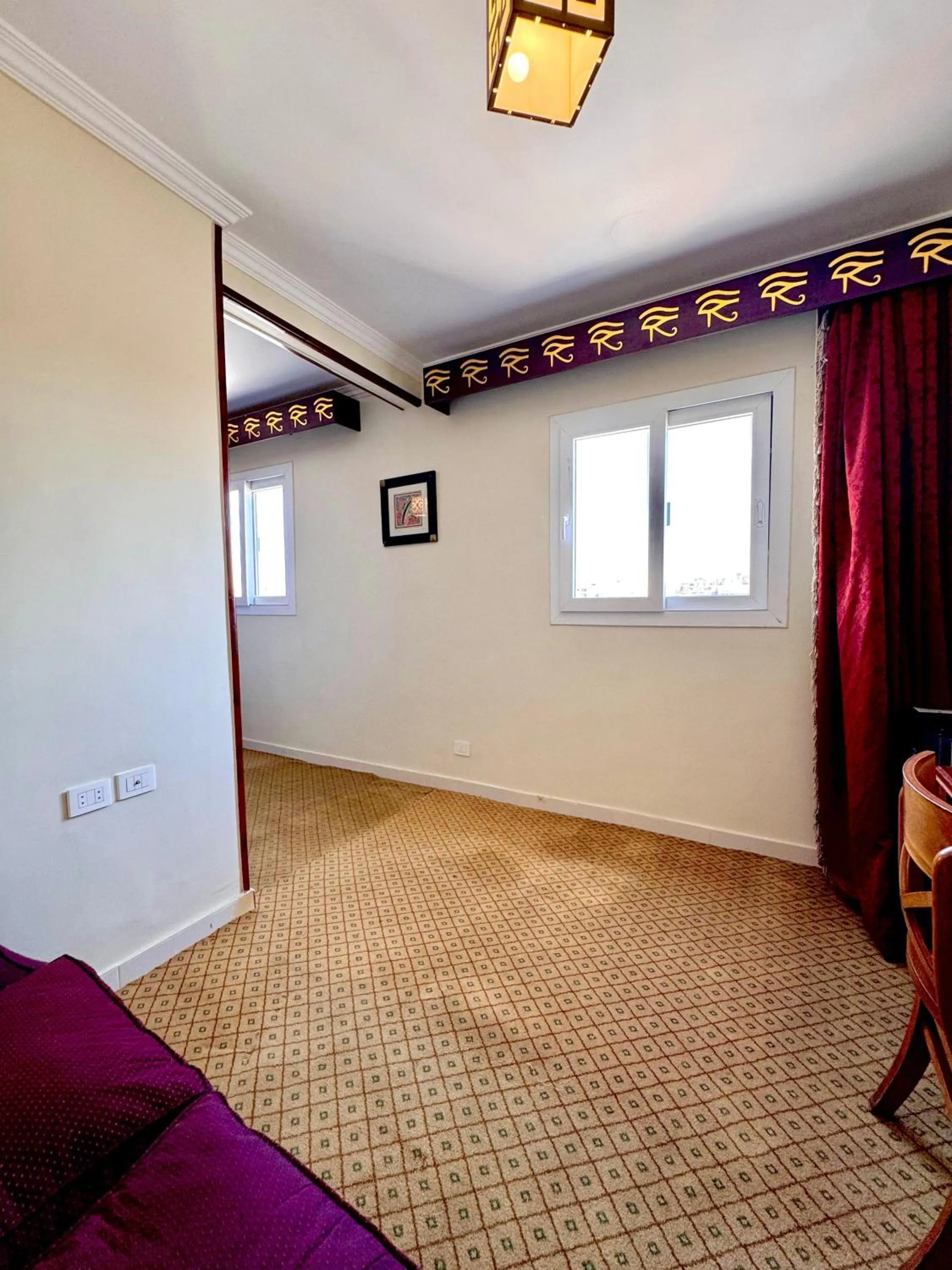 Bed in PYRAMIDS TOWER Inn