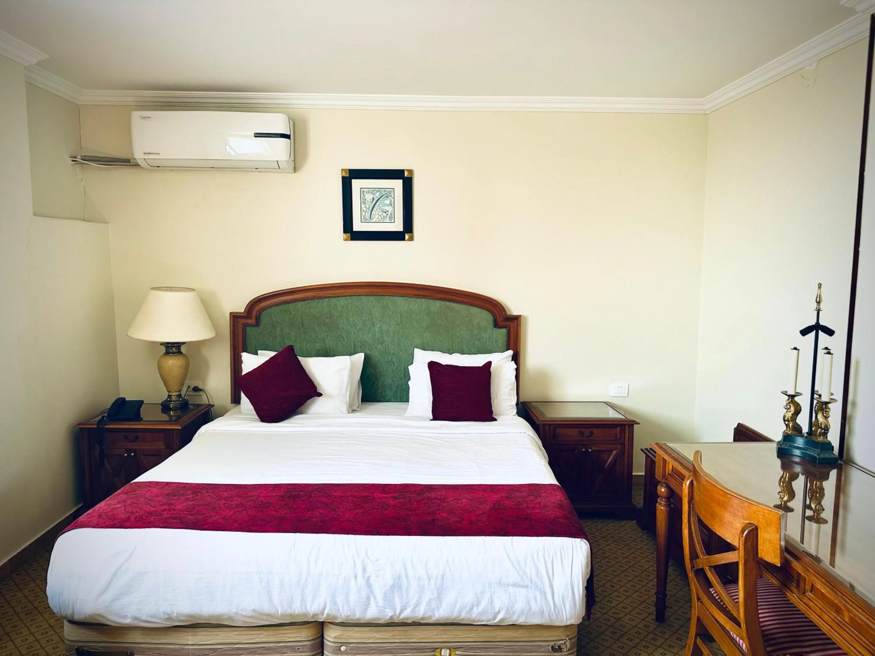 Bed in PYRAMIDS TOWER Inn