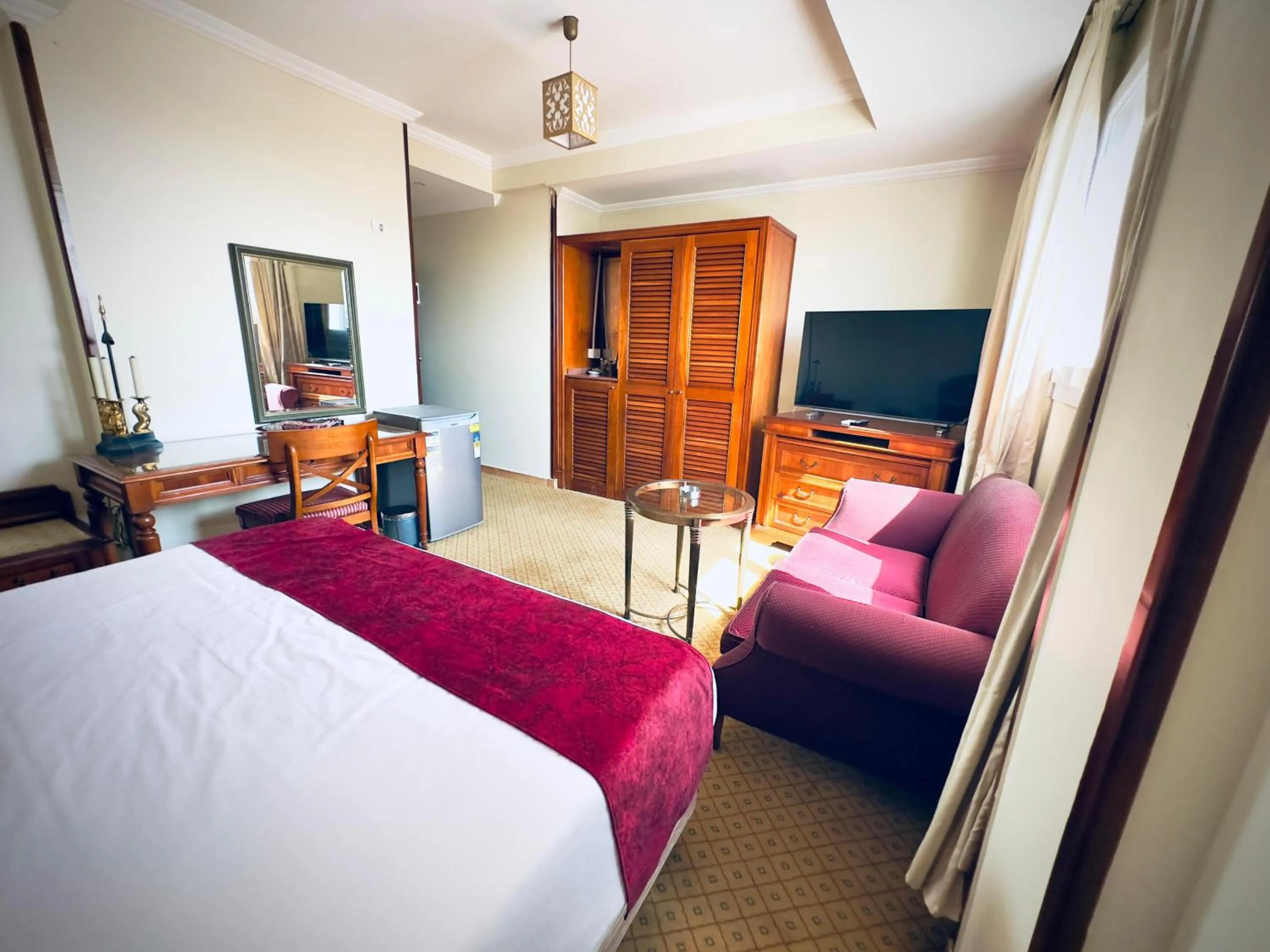 Bed in PYRAMIDS TOWER Inn