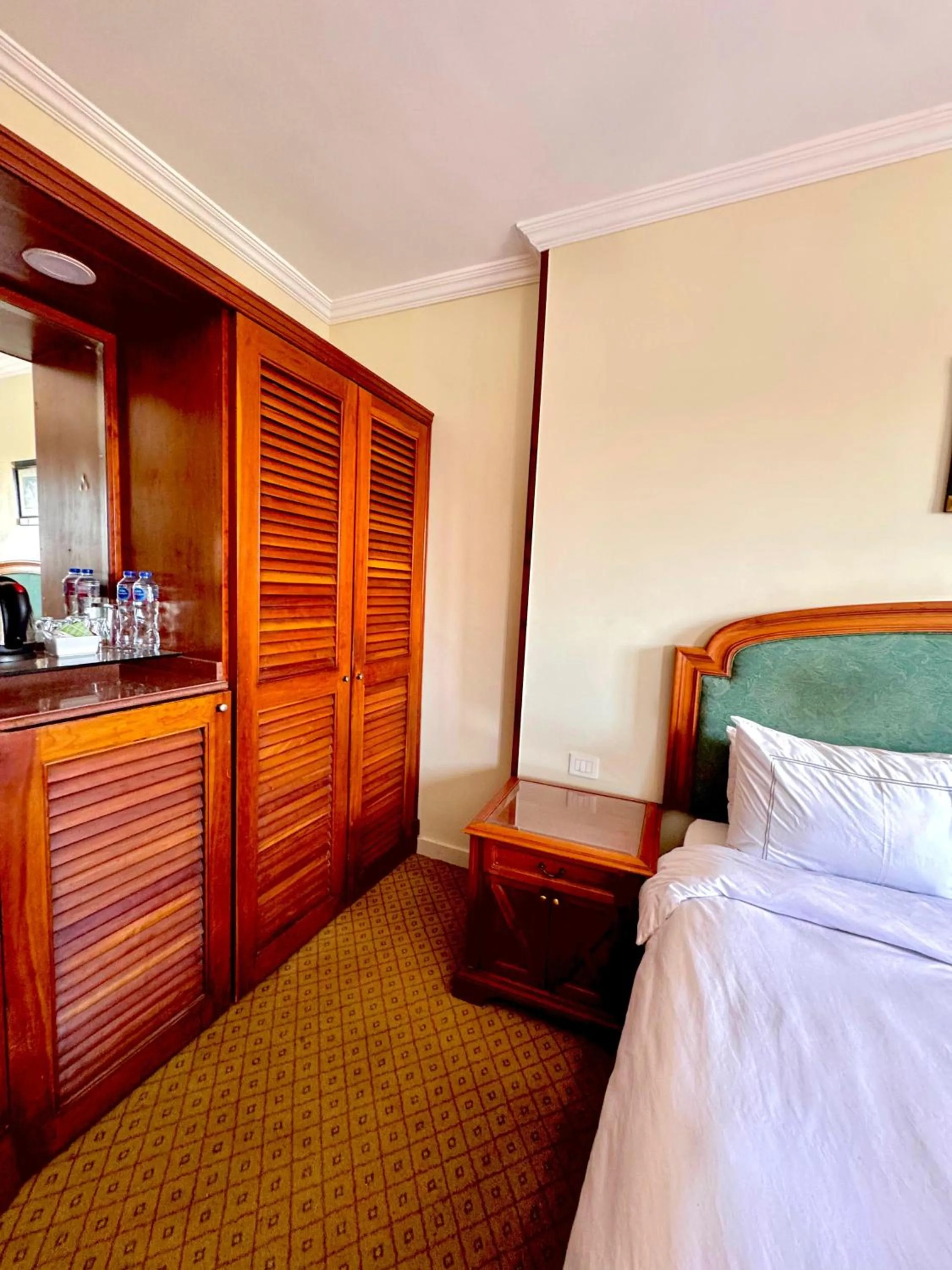 Bed in PYRAMIDS TOWER Inn