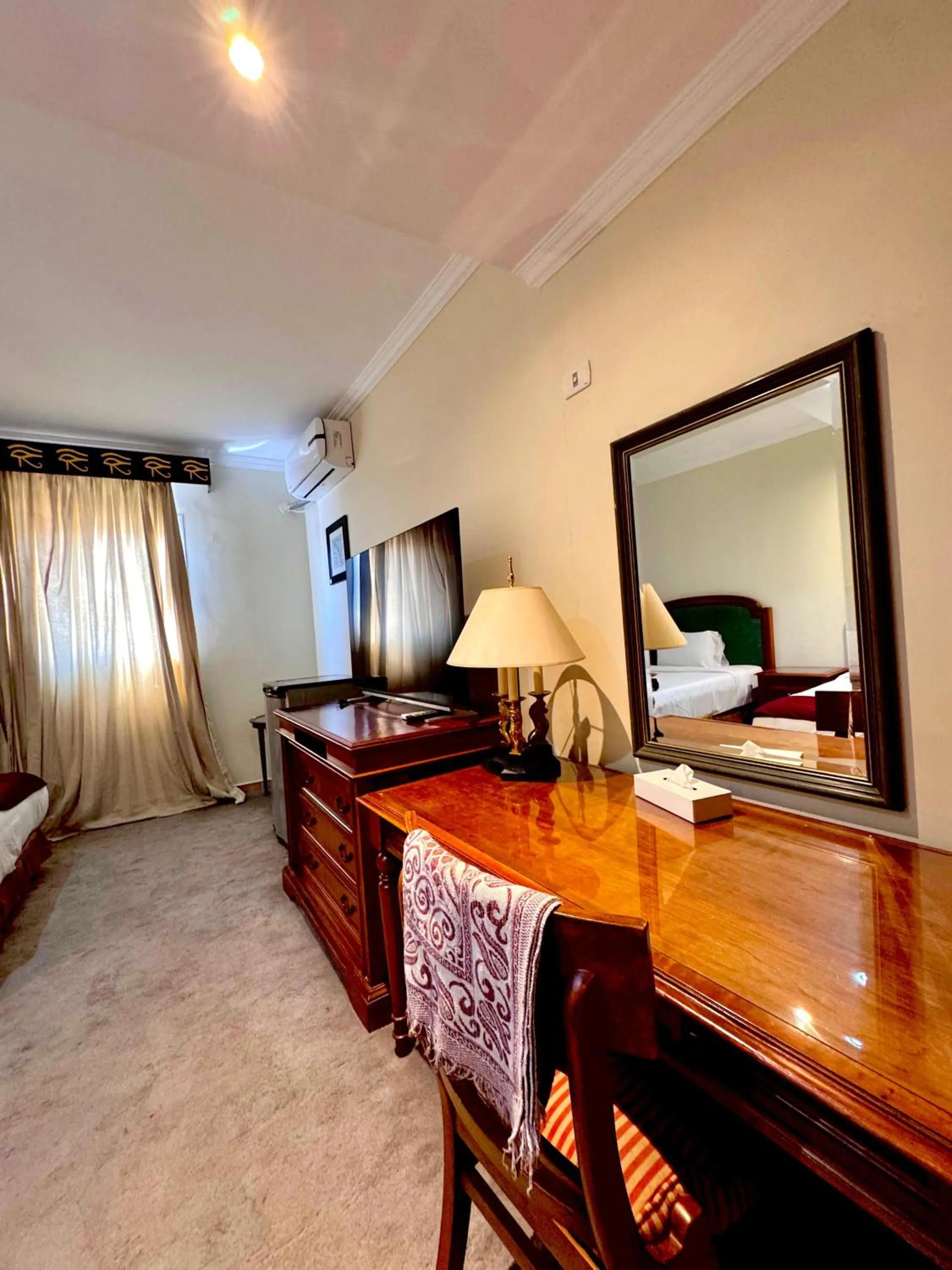 Bed in PYRAMIDS TOWER Inn