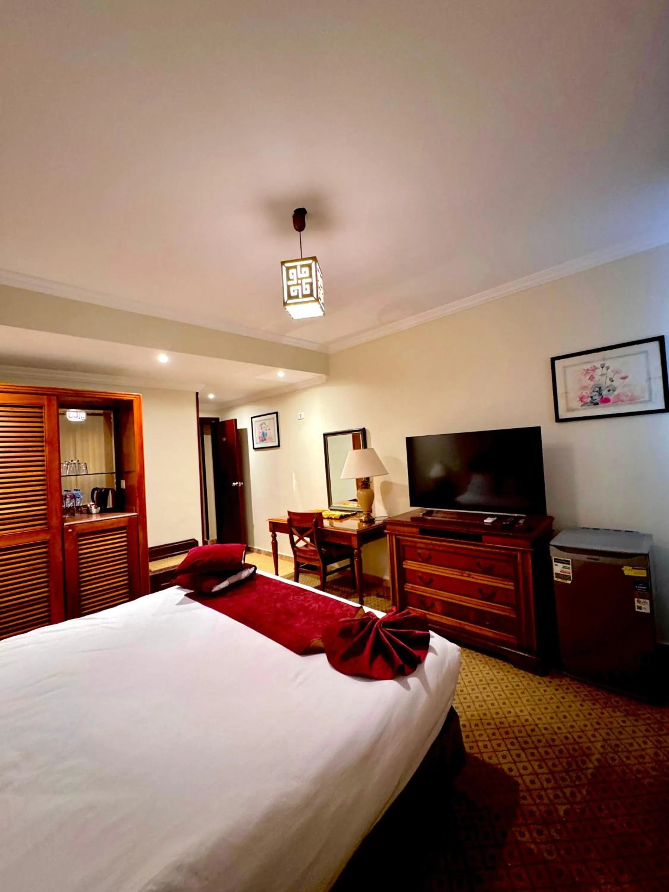 Bed in PYRAMIDS TOWER Inn