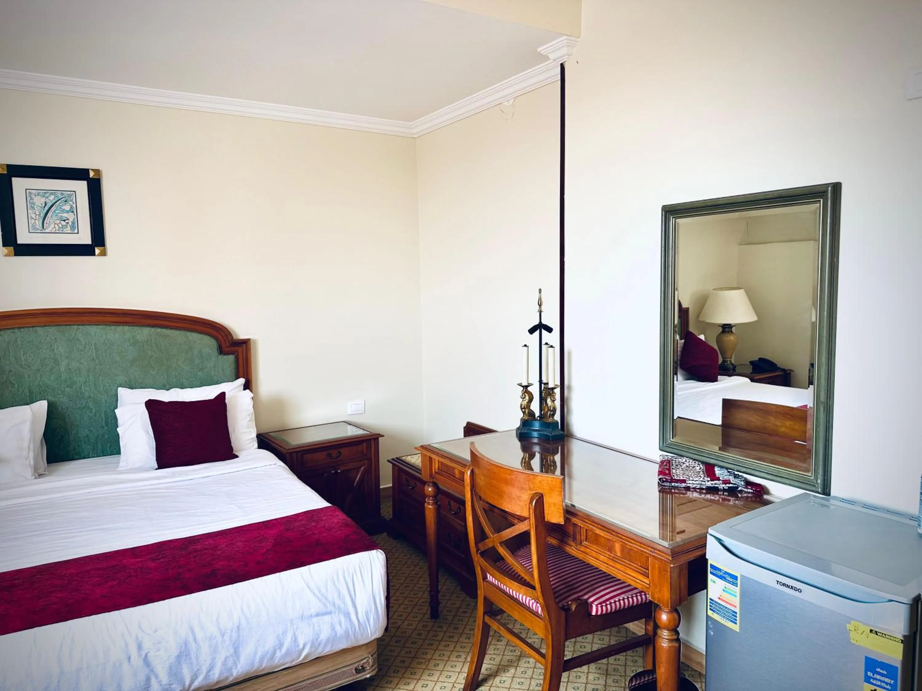 Bed in PYRAMIDS TOWER Inn