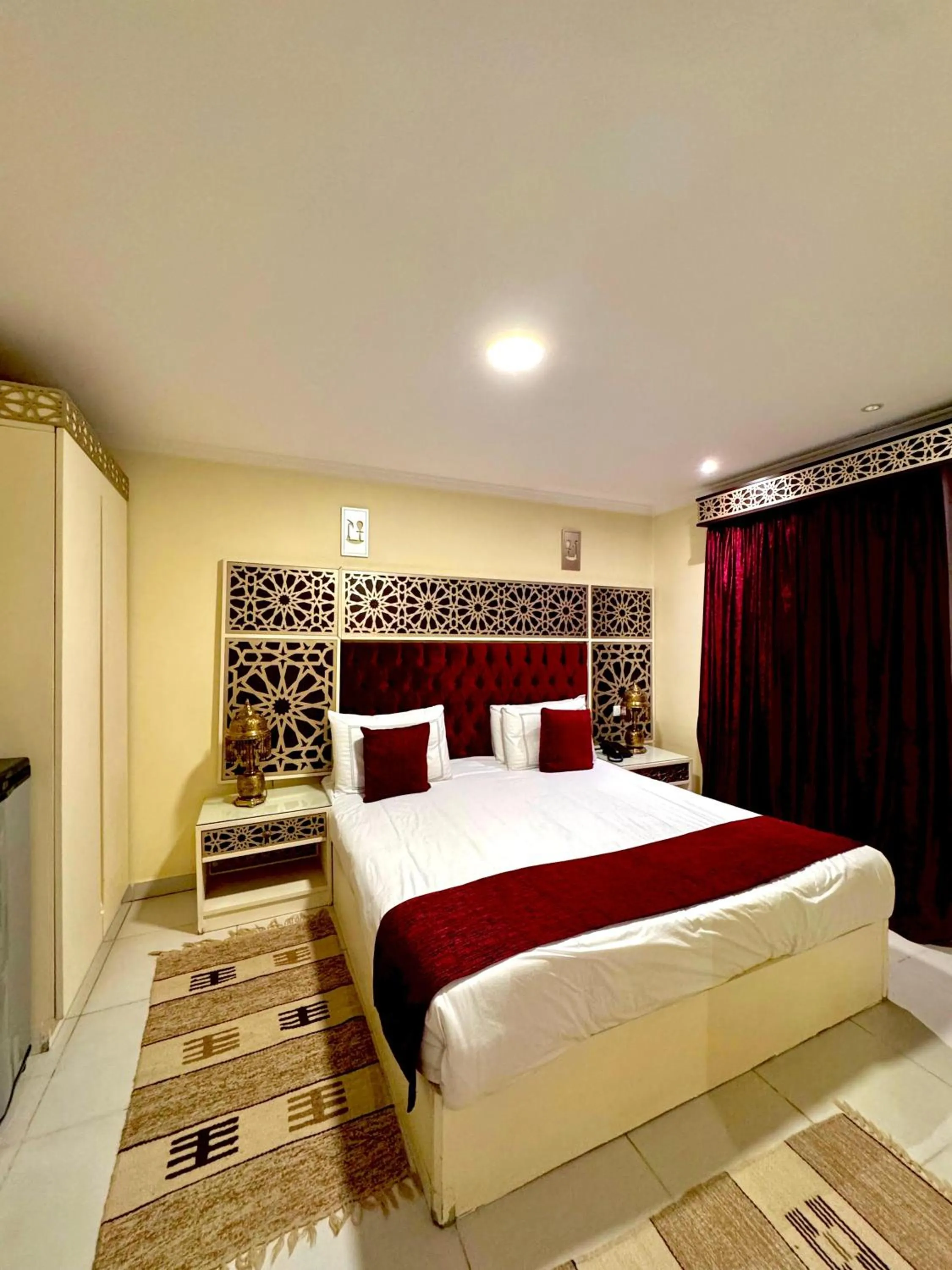 Bed in PYRAMIDS TOWER Inn