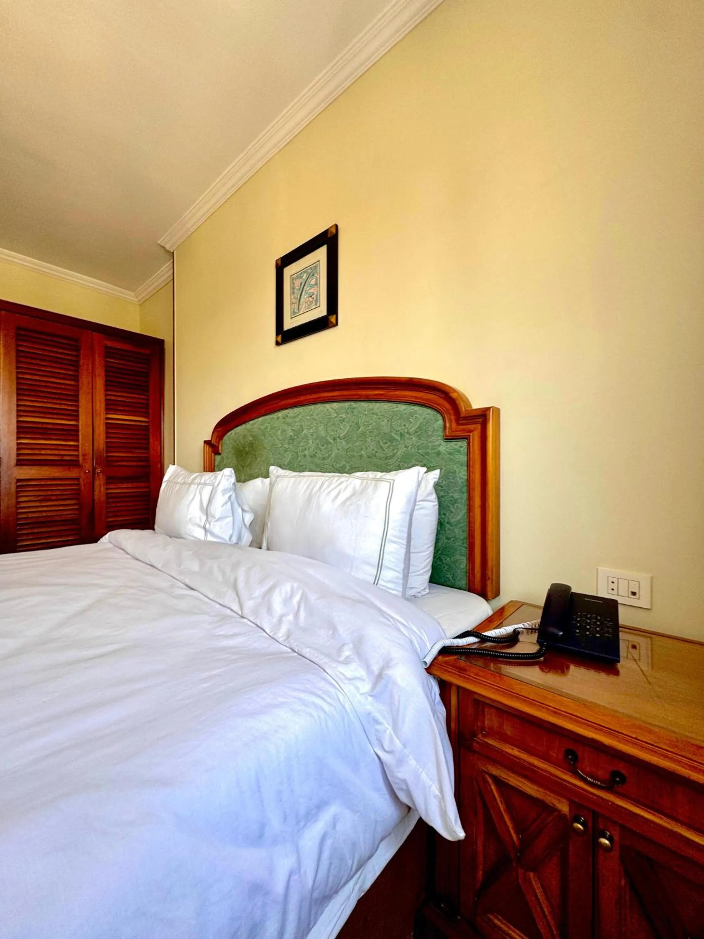 Bed in PYRAMIDS TOWER Inn