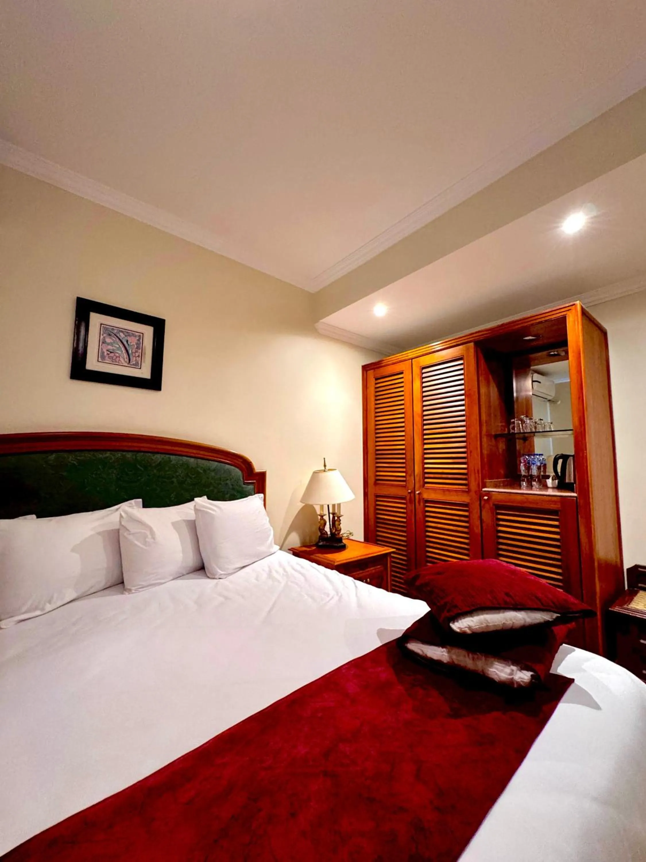 Bed in PYRAMIDS TOWER Inn