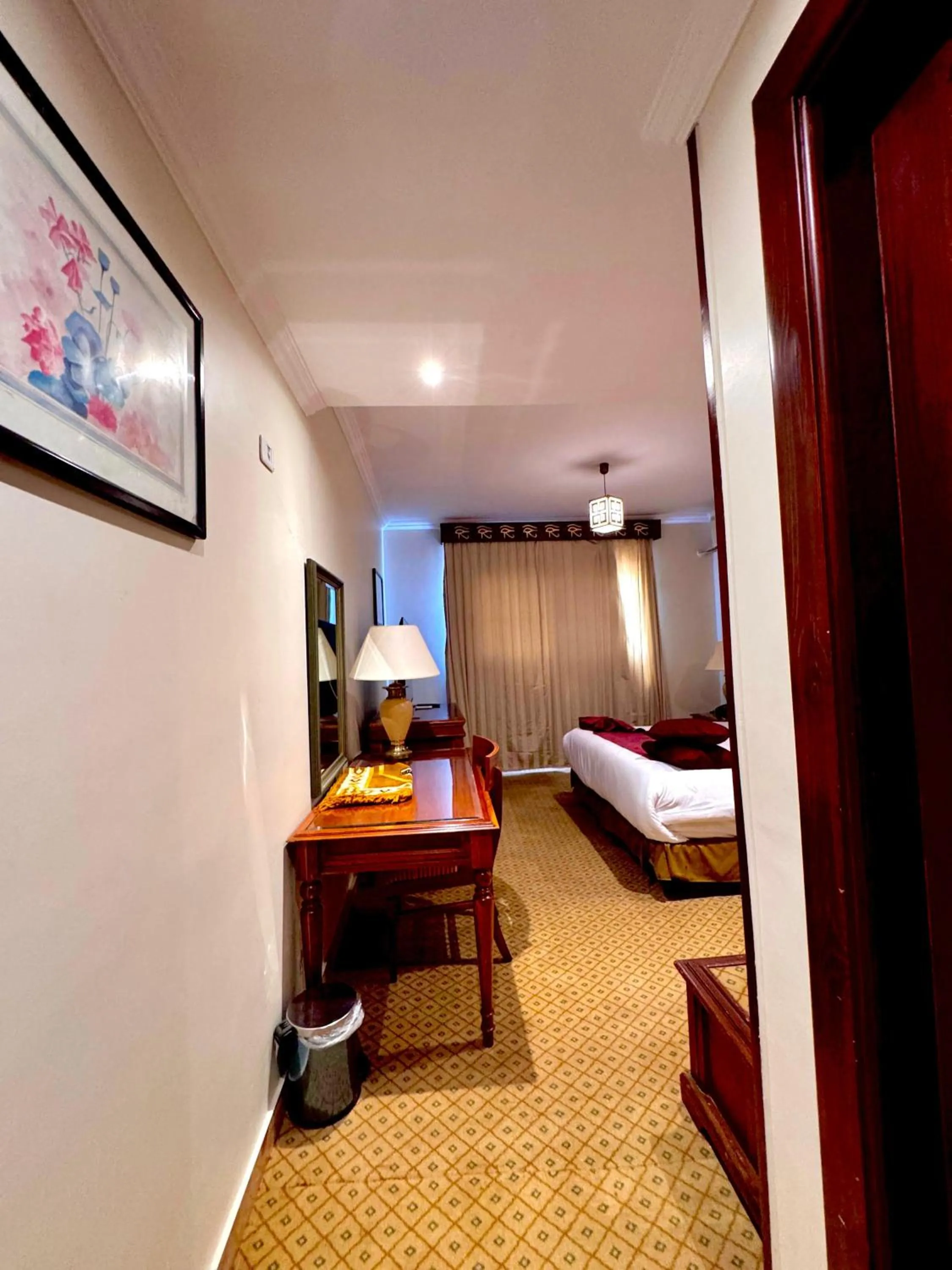 Bed in PYRAMIDS TOWER Inn