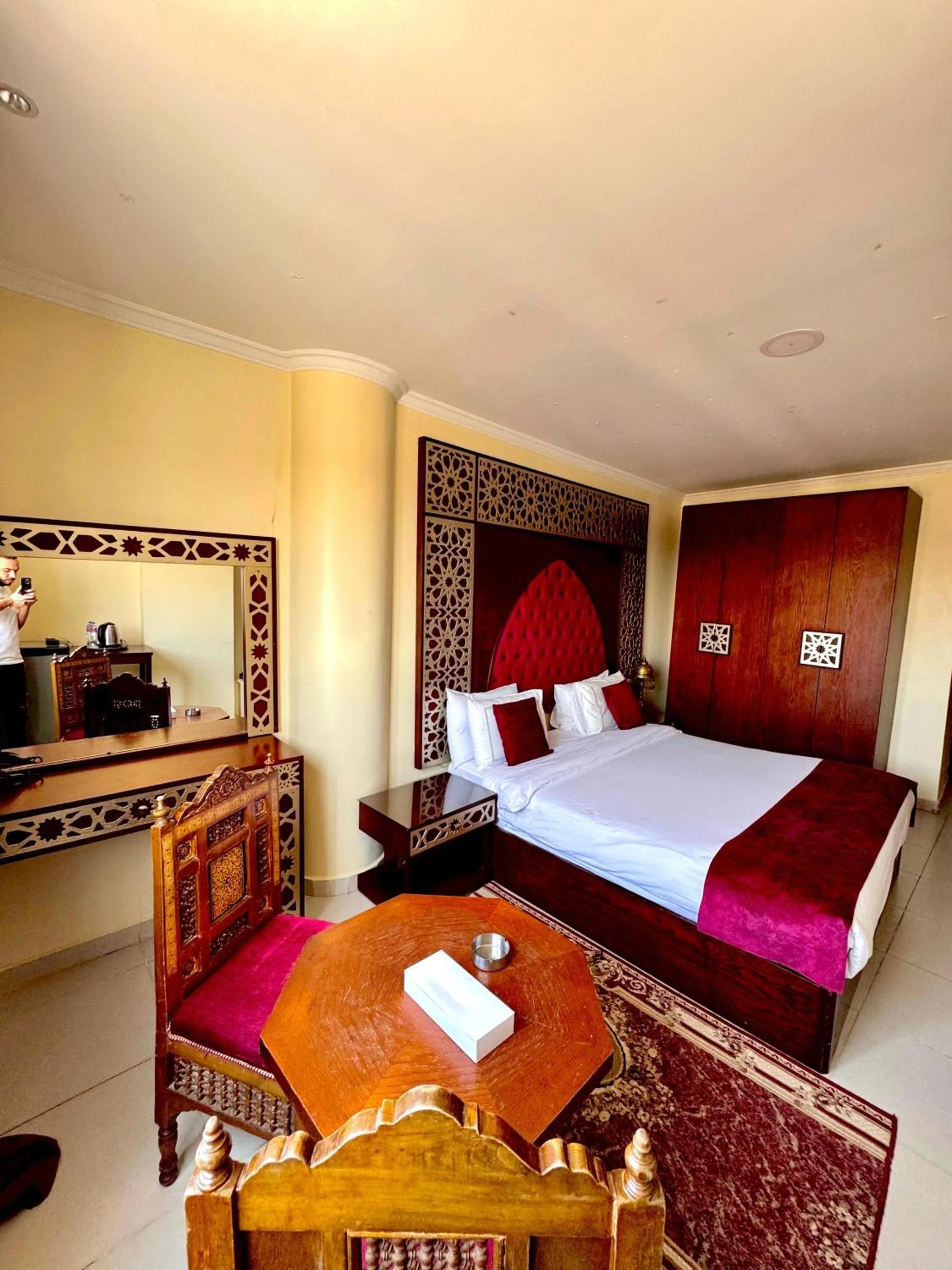 Bed in PYRAMIDS TOWER Inn