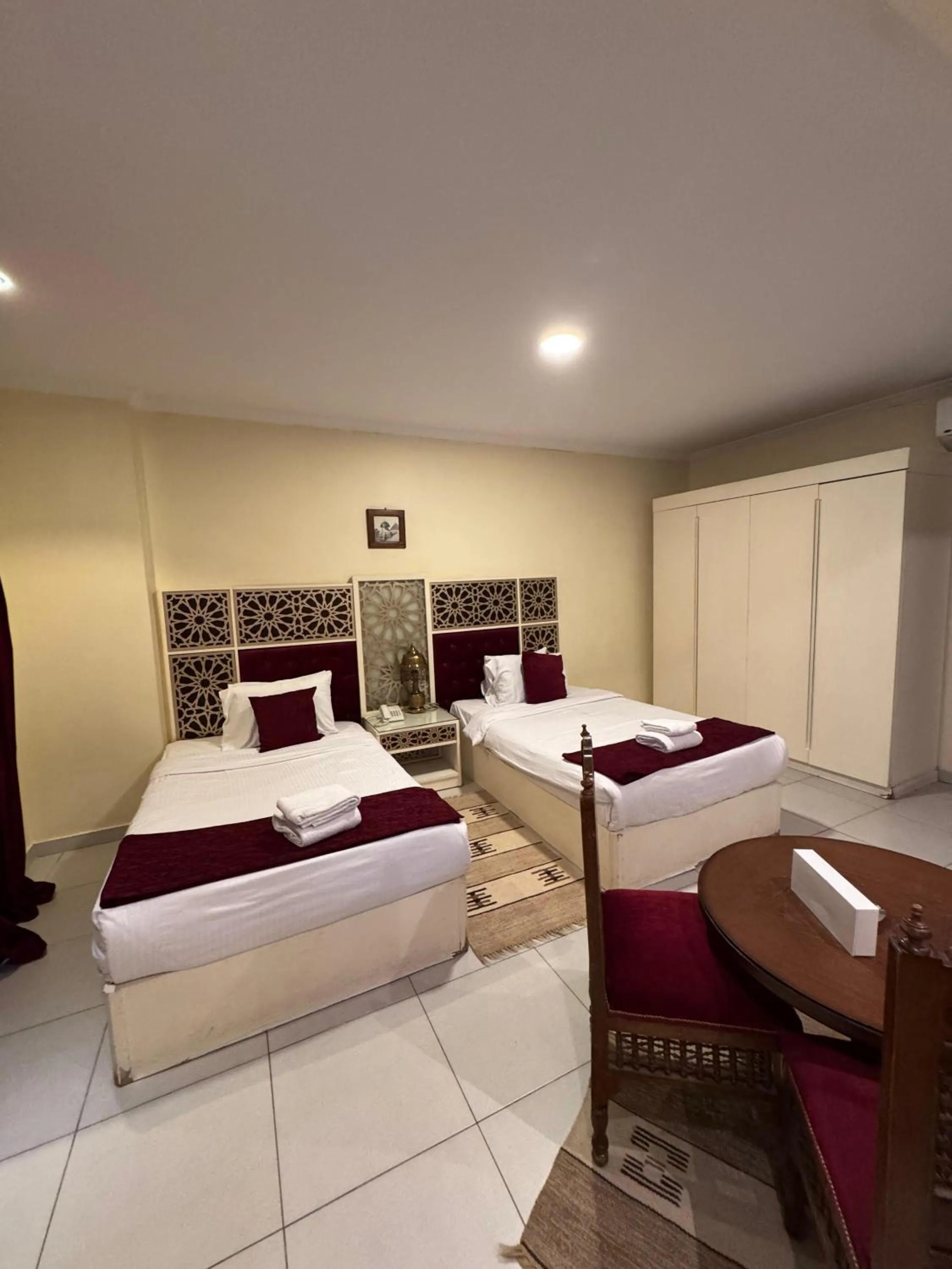 Bed in PYRAMIDS TOWER Inn