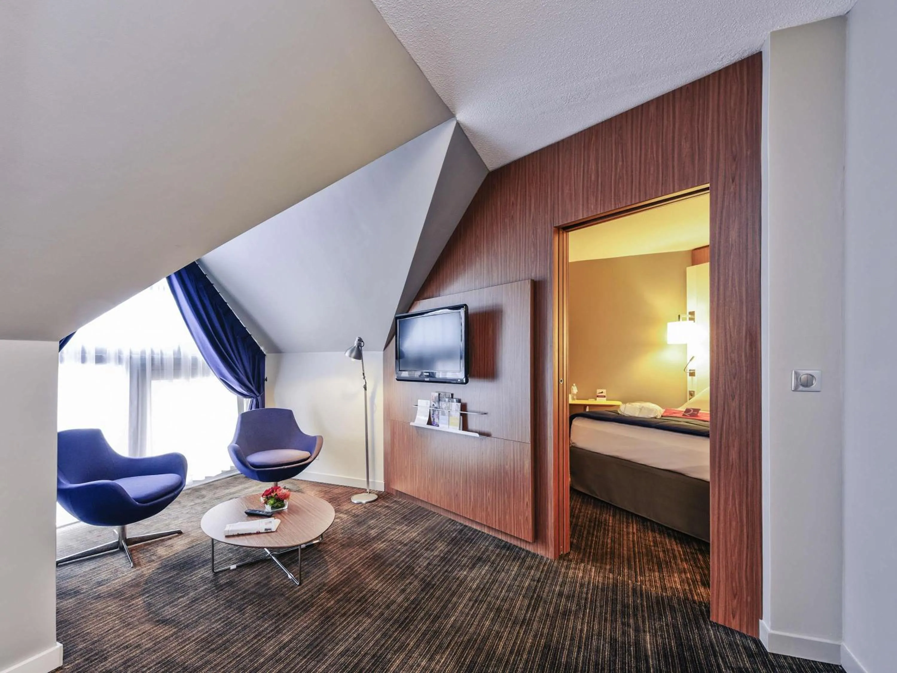 Photo of the whole room, Bed in Mercure Rennes Centre Parlement