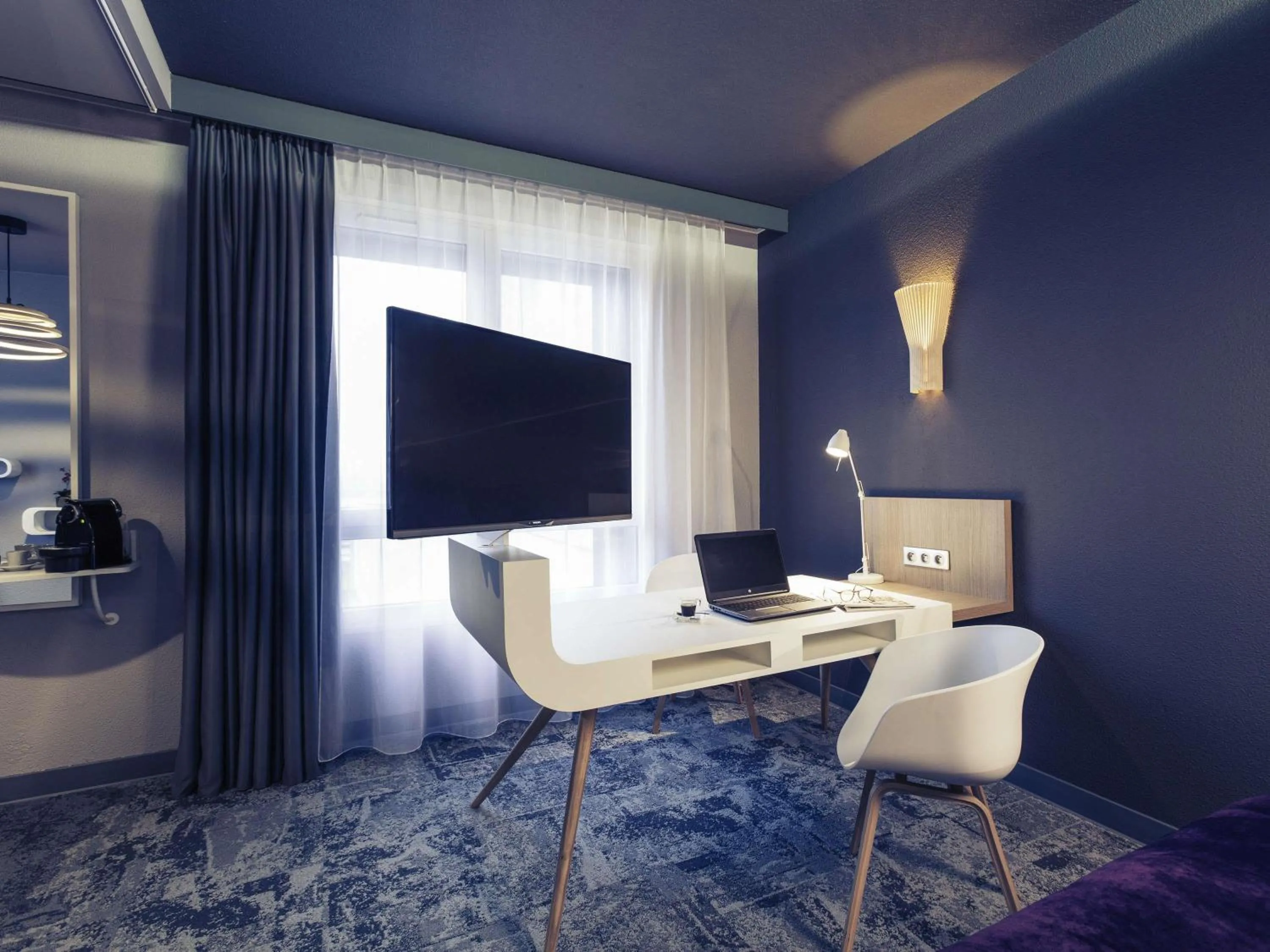 Bedroom in Mercure La Roche Sur Yon