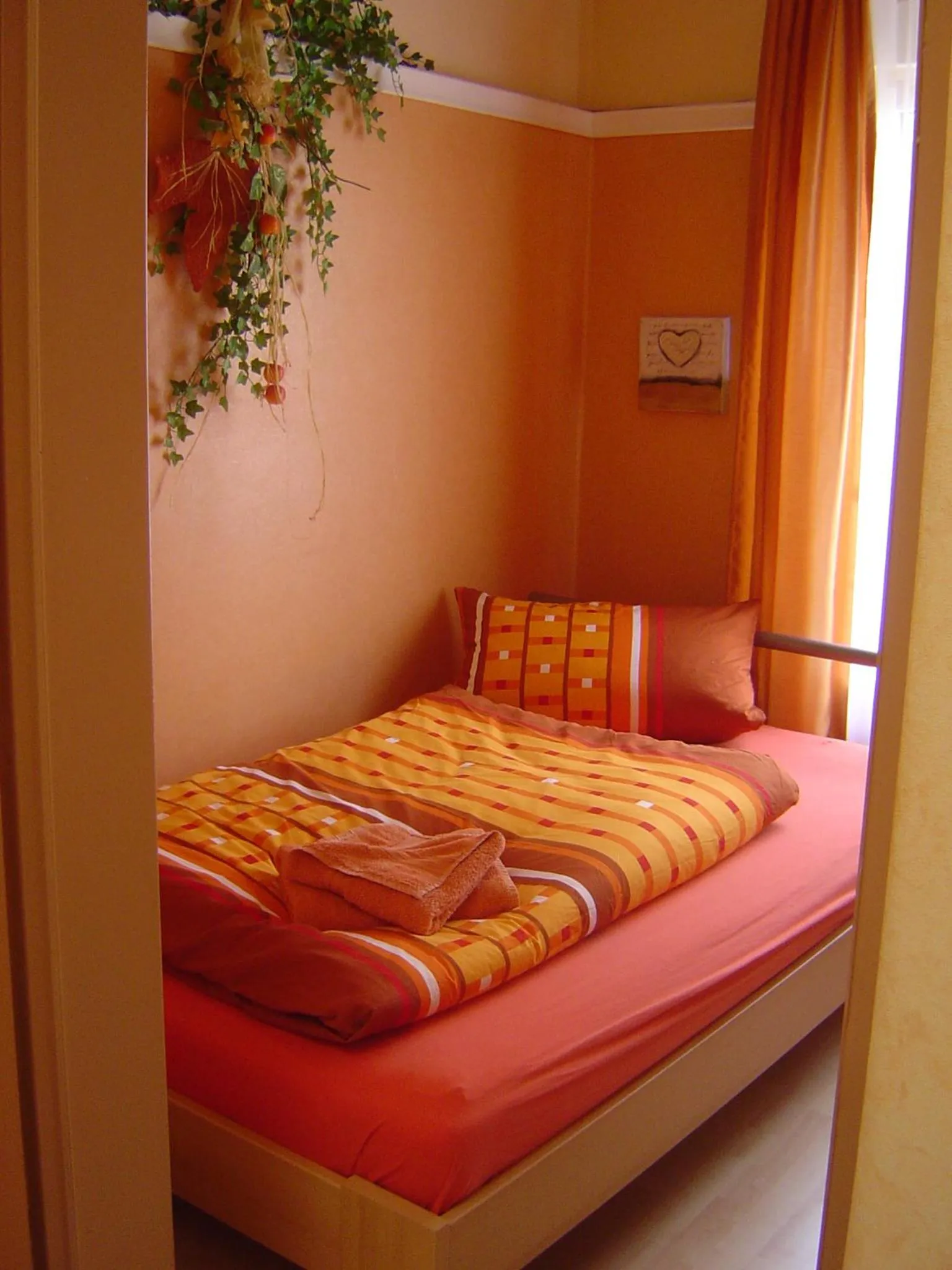 Bed in ApartmentHotel Vollumen