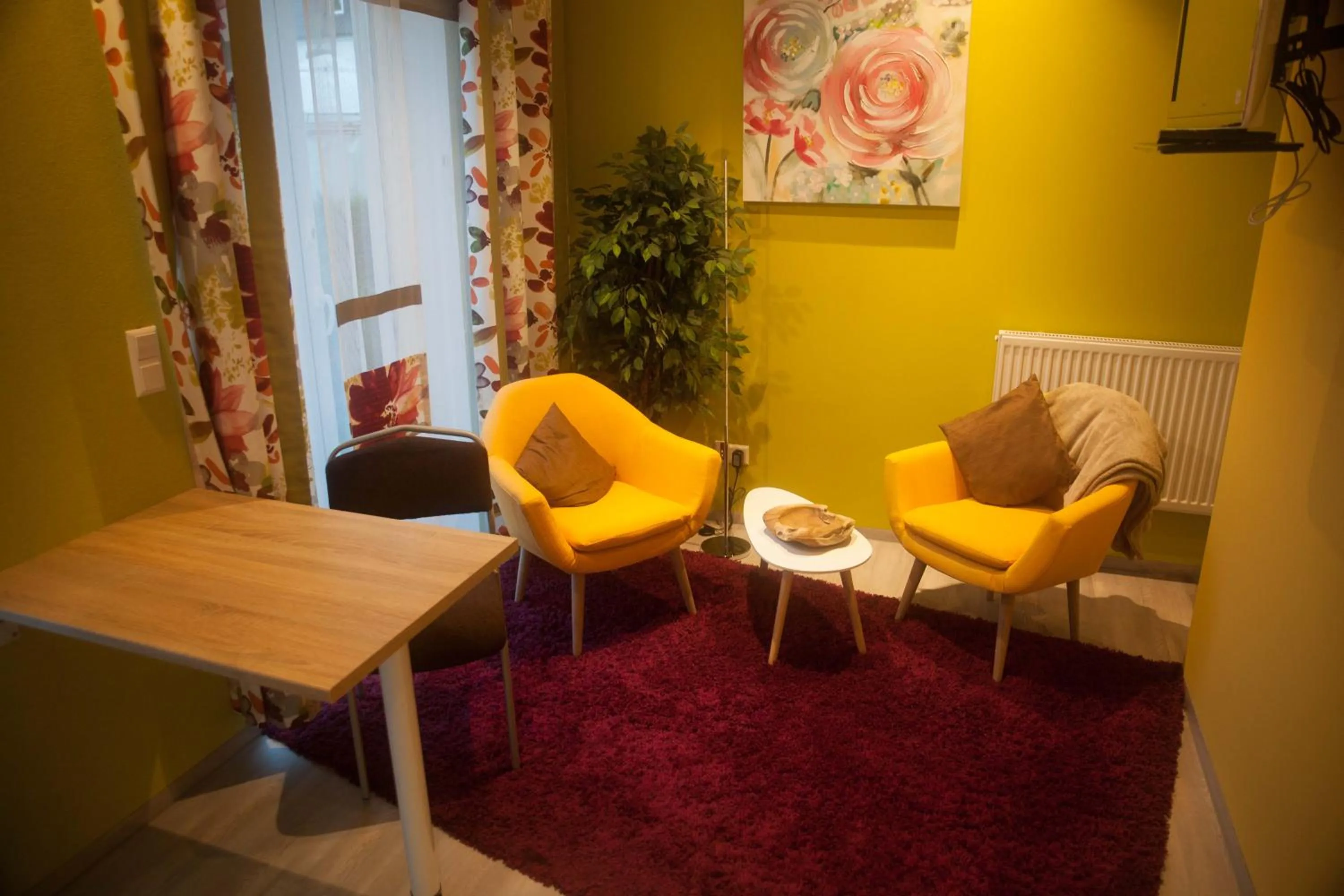 Living room in ApartmentHotel Vollumen