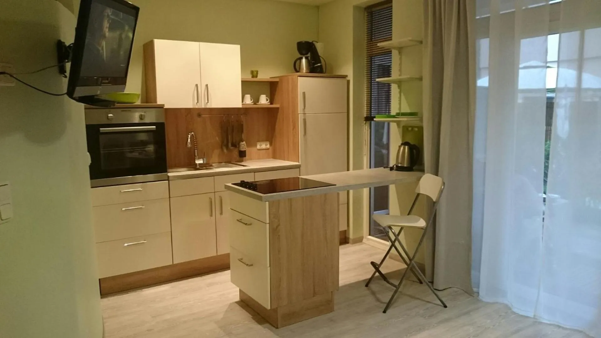 Kitchen or kitchenette in ApartmentHotel Vollumen