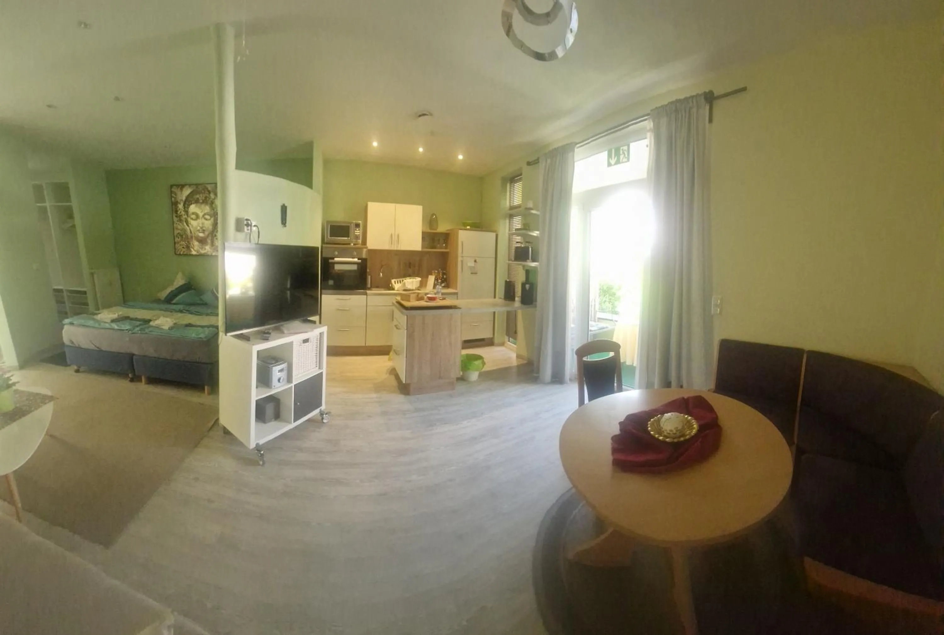 Kitchen or kitchenette, Bed in ApartmentHotel Vollumen